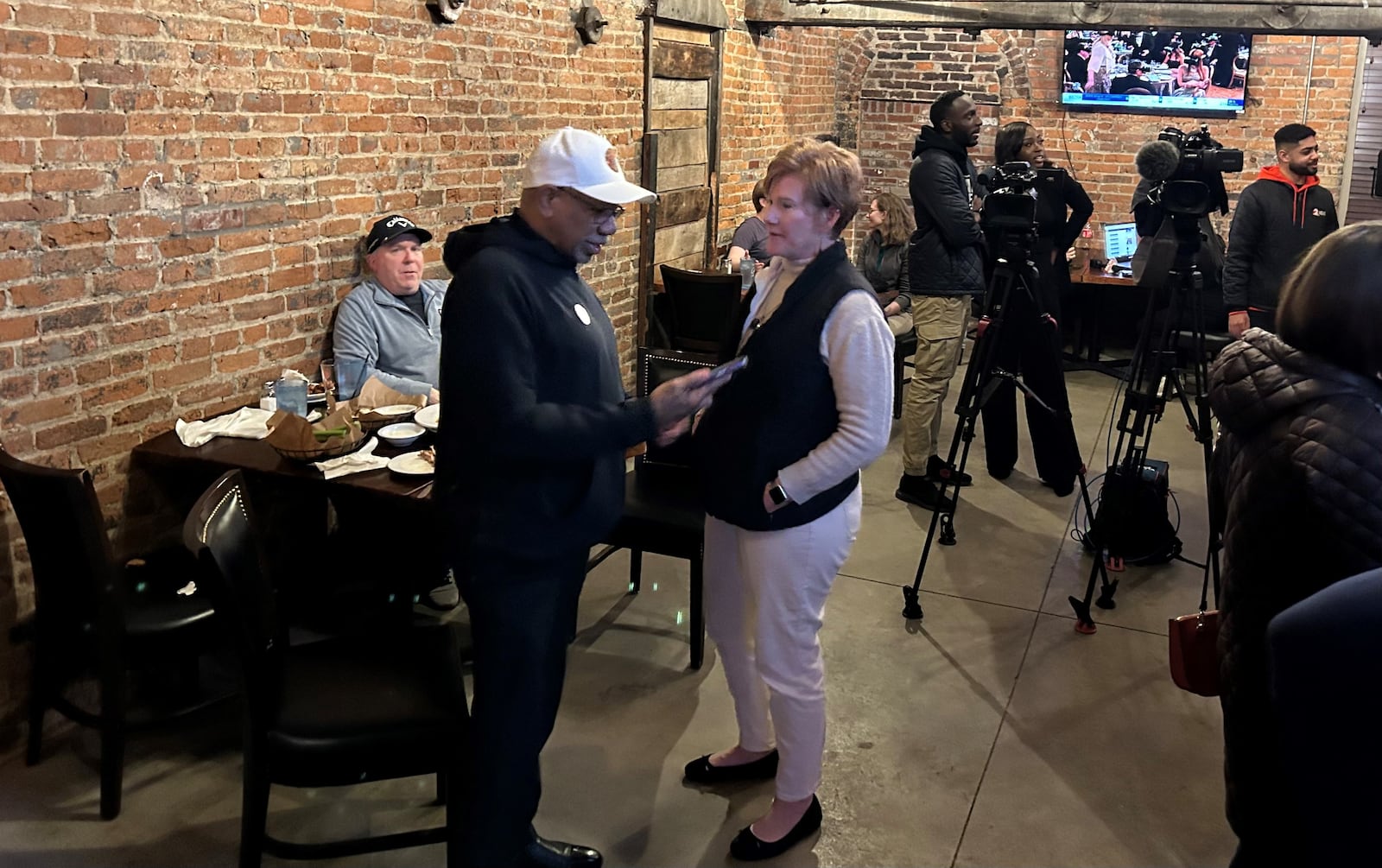 Dayton Mayor Jeffrey Mims Jr. and City Manager Shelley Dickstein at an election results watch party on March 19, 2024. (JEREMY KELLEY)