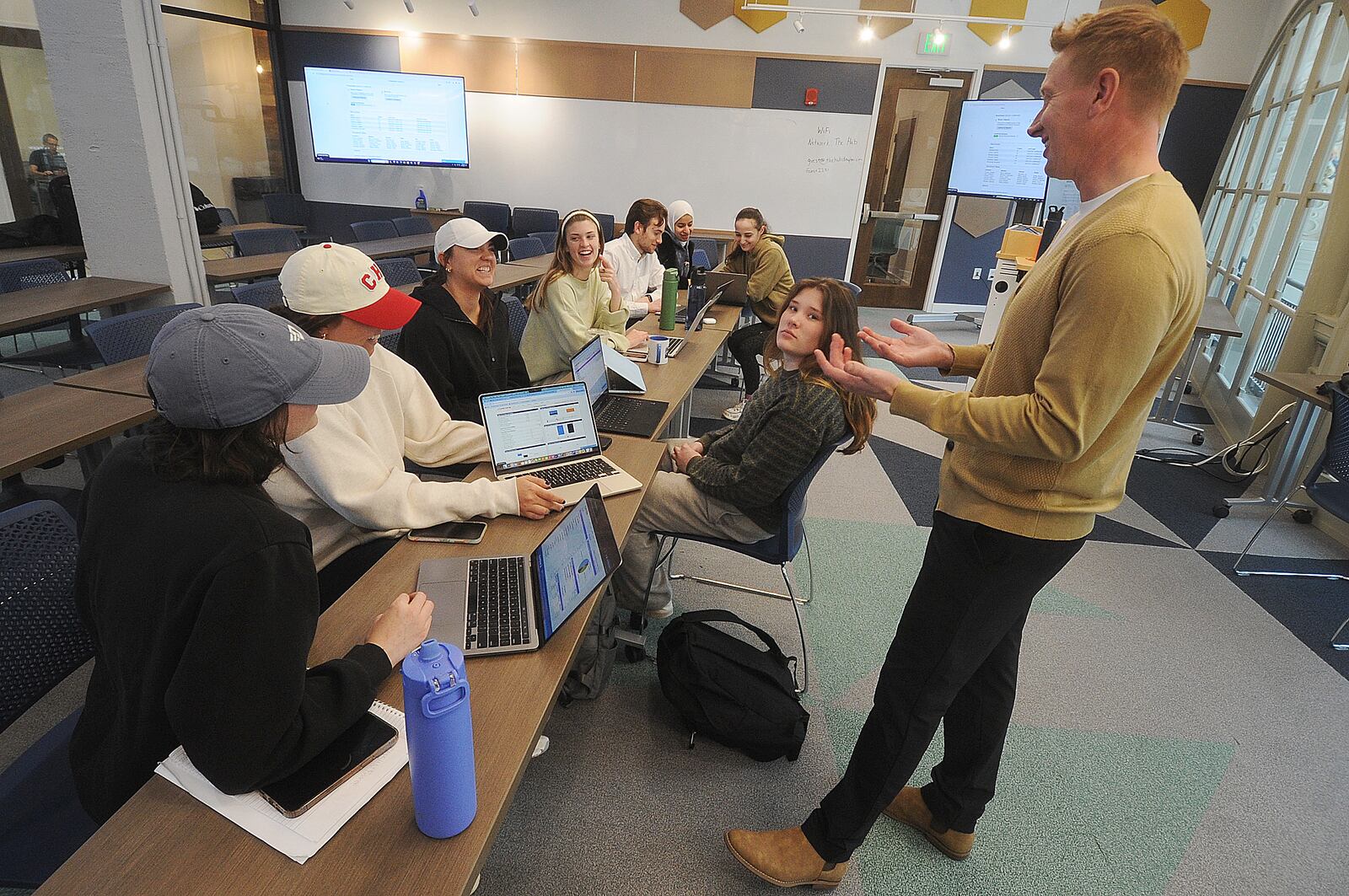 One of the University of Dayton classrooms inside The Hub Powered by PNC Bank at the Arcade in downtown Dayton. Dave Marshall, professor of management at U.D., is teaching a strategic management class at the Hub, MARSHALL GORBY\STAFF