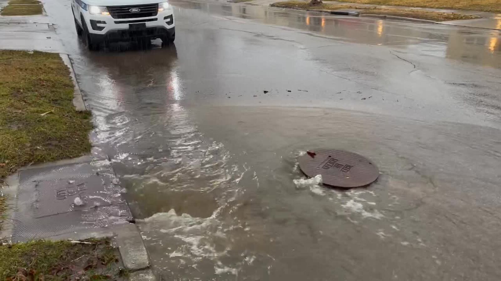 Heavy rain overwhelms a storm sewer Thursday, Feb. 17, 2022, on Nicholas Road in Dayton, one of three days Dayton set a daily rainfall record in February. Dayton, Cincinnati and Columbus experienced the top 10 wettest February, according to records going back more than 100 years.  JIM NOELKER/STAFF