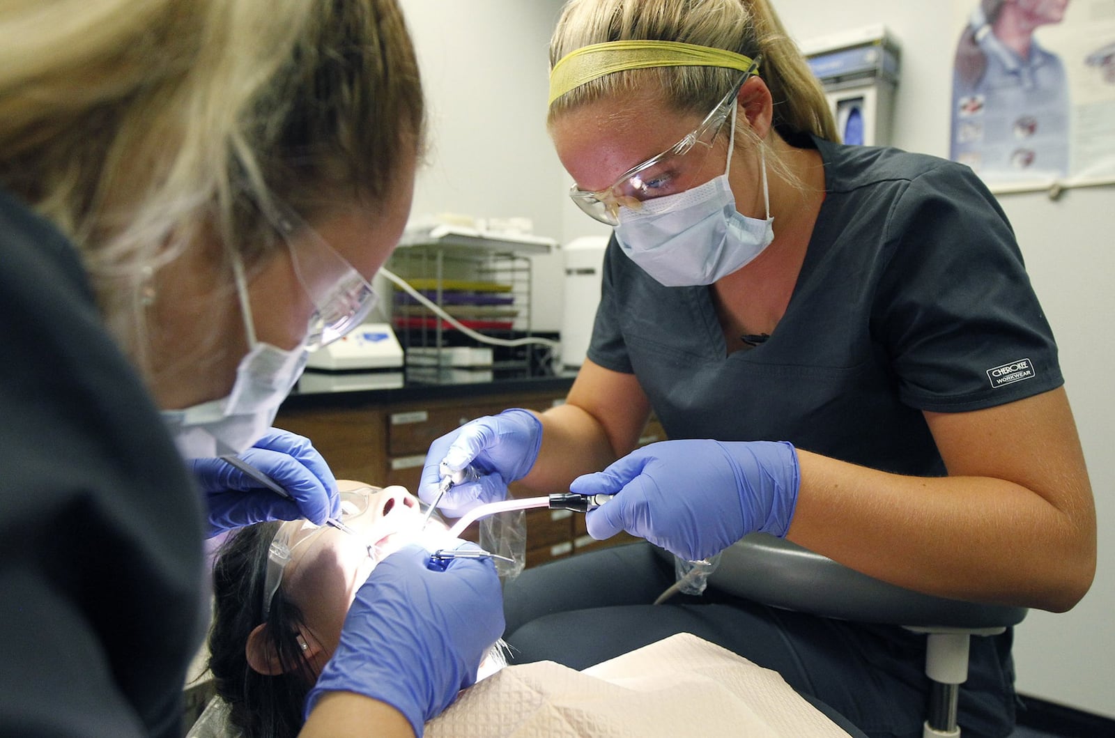 High School senior Kirsten Zink is in the Miami Valley Career Technology Center’s Dental Assistant program. Zink, pictured here in September 2018, is planning on a careen as a dental hygienist. TY GREENLEES / STAFF