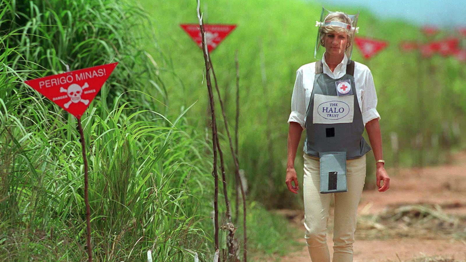 Diana, Princess Of Wales, visited a minefield that was being cleared by the charity Halo in Huambo, Angola, wearing protective body armor and a visor in 1997.