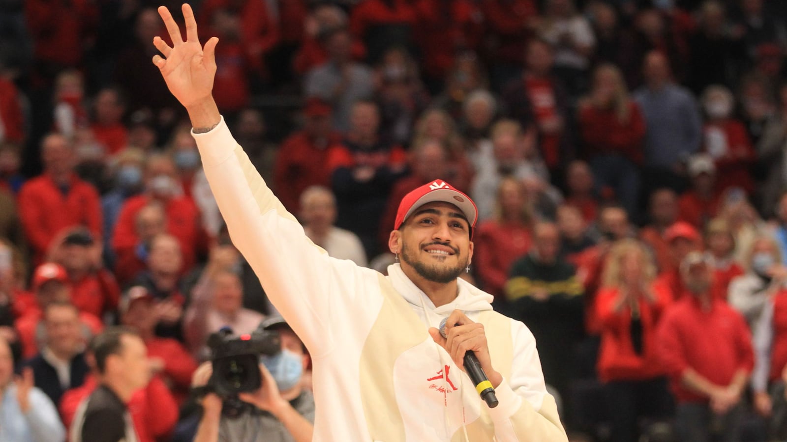 Obi Toppin waves to the crowd at UD Arena during the first half of a game between Dayton and Virginia Commonwealth on Wednesday, Jan. 5, 2021. David Jablonski/Staff