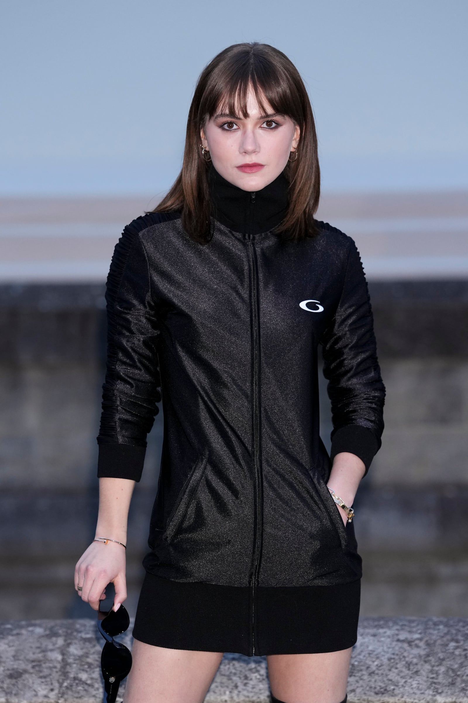 Emilia Jones upon arrival at the Balenciaga Fall/Winter 2025-2026 Womenswear collection presented in Paris, Sunday, March 9, 2025. (Photo by Scott A Garfitt/Invision/AP)