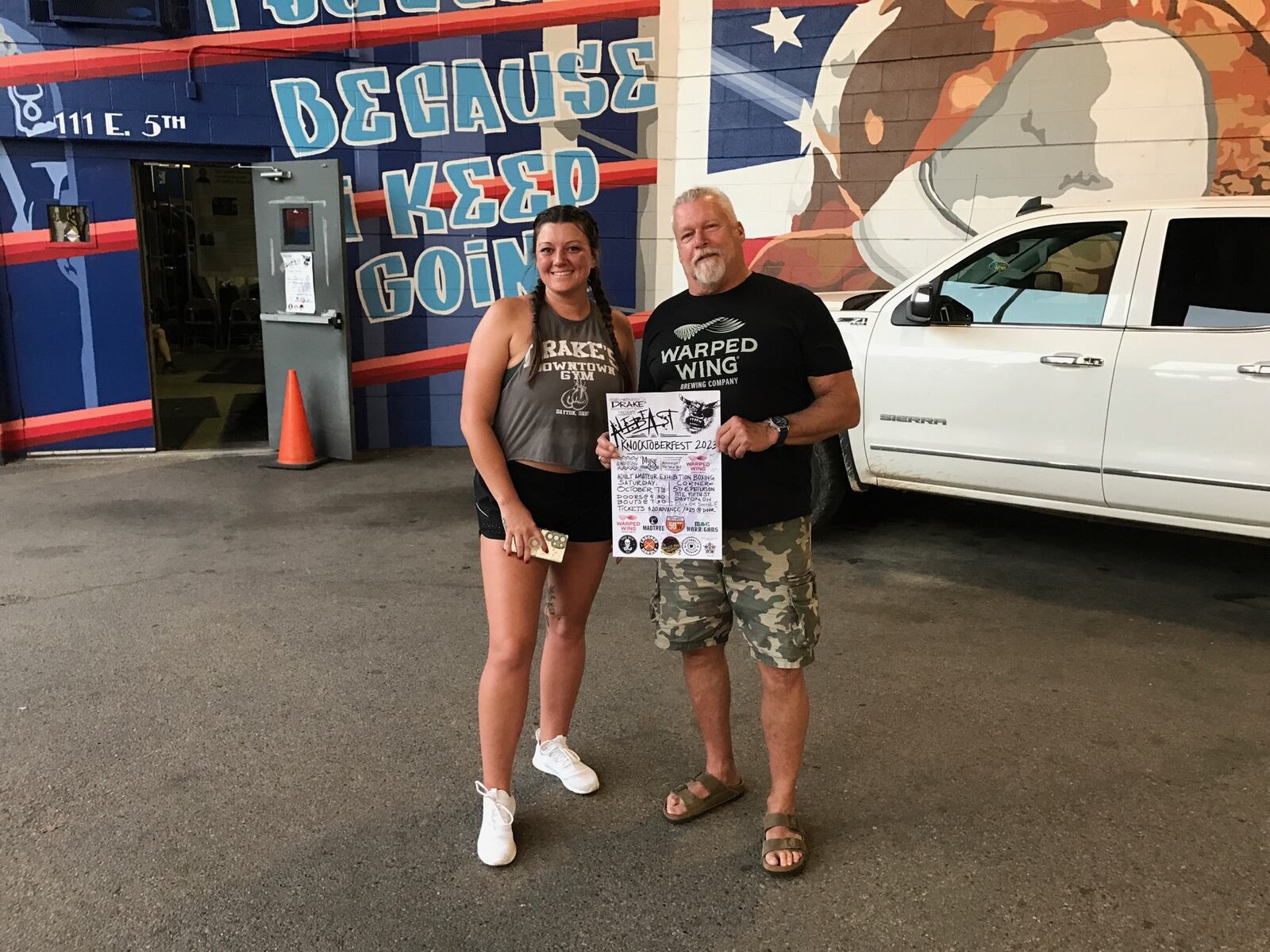 John Drake and gym trainer Morgan Schockman, who also will be fighting on Saturday night’s 10-bout outdoor show they’re calling Knocktoberfest 2023. The event – held in front of Drake’s Downtown Gym at the corner of 5th and Patterson – celebrates his 25 years in the boxing gym business in downtown Dayton. Tom Archdeacon/CONTRIBUTED