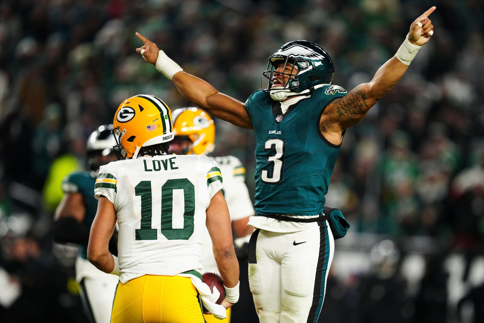 Philadelphia Eagles linebacker Nolan Smith Jr. (3) reacts after sacking Green Bay Packers quarterback Jordan Love (10) during the second half of an NFL wild-card playoff football game Sunday, Jan. 12, 2025, in Philadelphia. (AP Photo/Derik Hamilton)