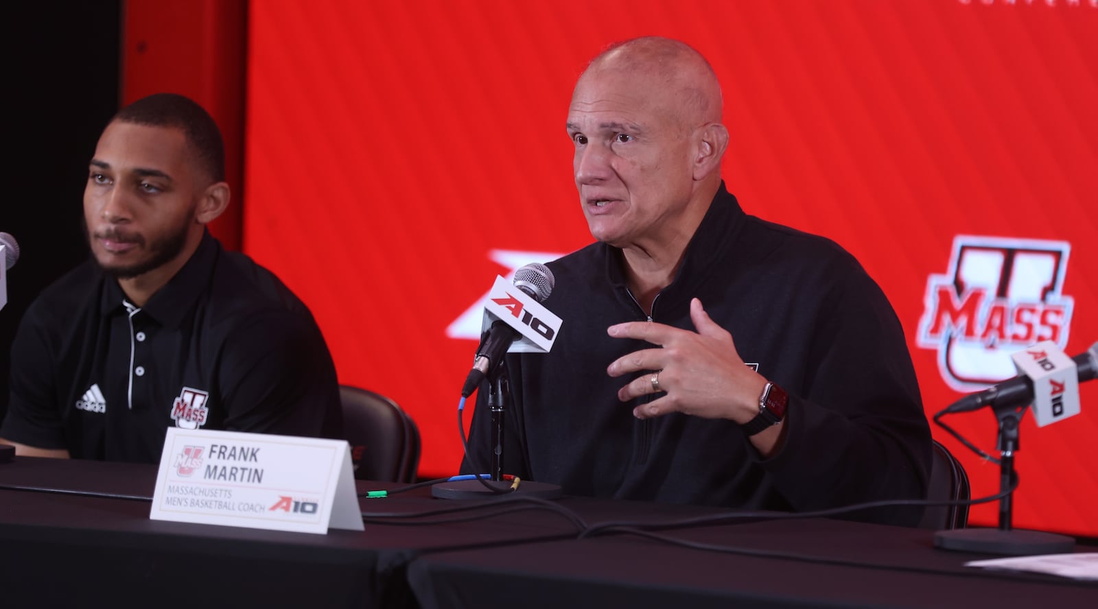 Frank Martin, of Massachusetts, and Rahsool Diggins speak at Atlantic 10 Conference Media Day on Monday, Oct. 7, 2024, at District E next to Capital One Arena in Washington, D.C. David Jablonski/Staff