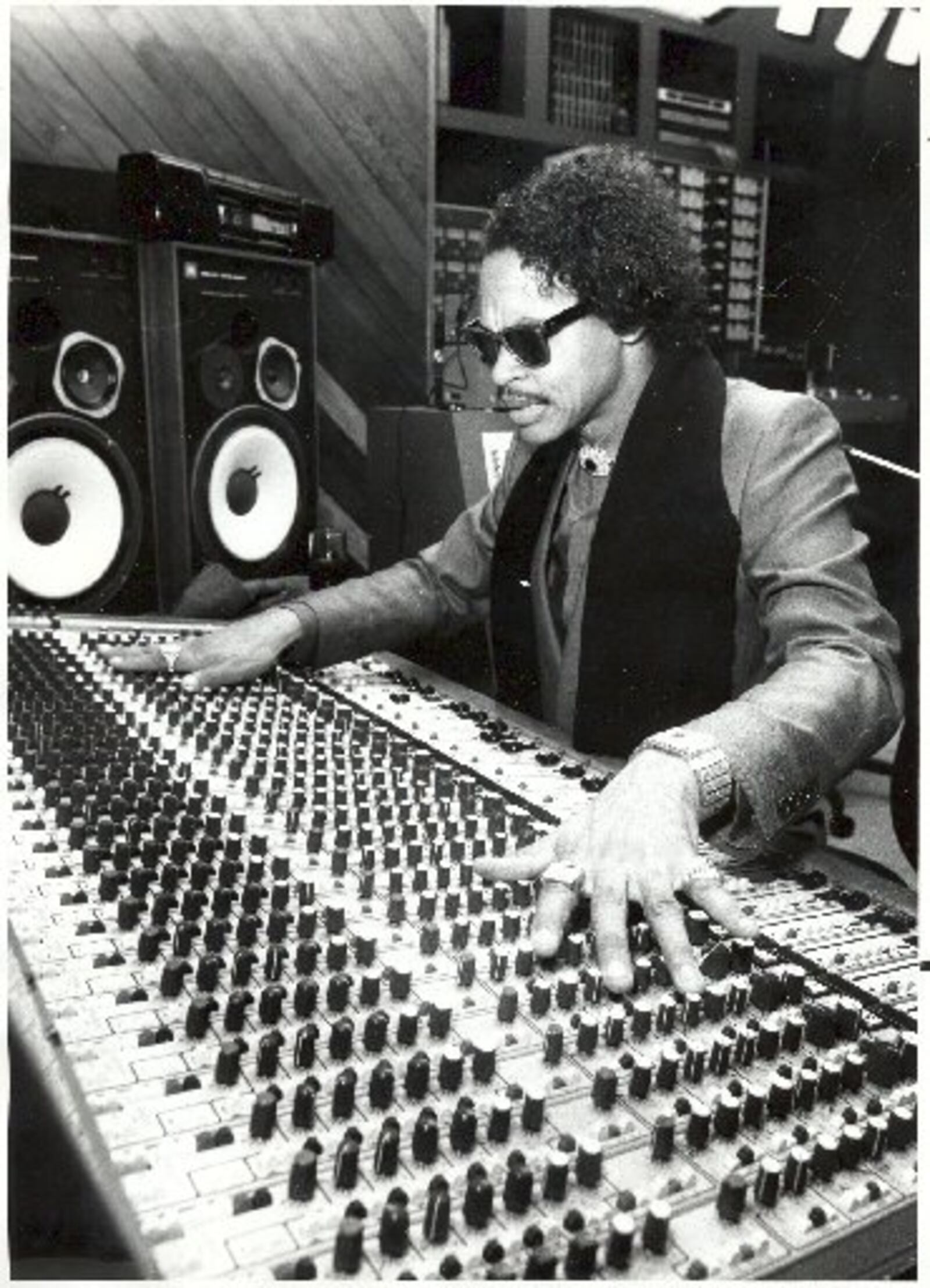 Roger Troutman works at the control board of his studio in an undated photo. Troutman, a musician and leader of the band Zapp, was shot and killed by his brother, Larry Troutman, on April 25, 1999. (Contributed photo)(no description)