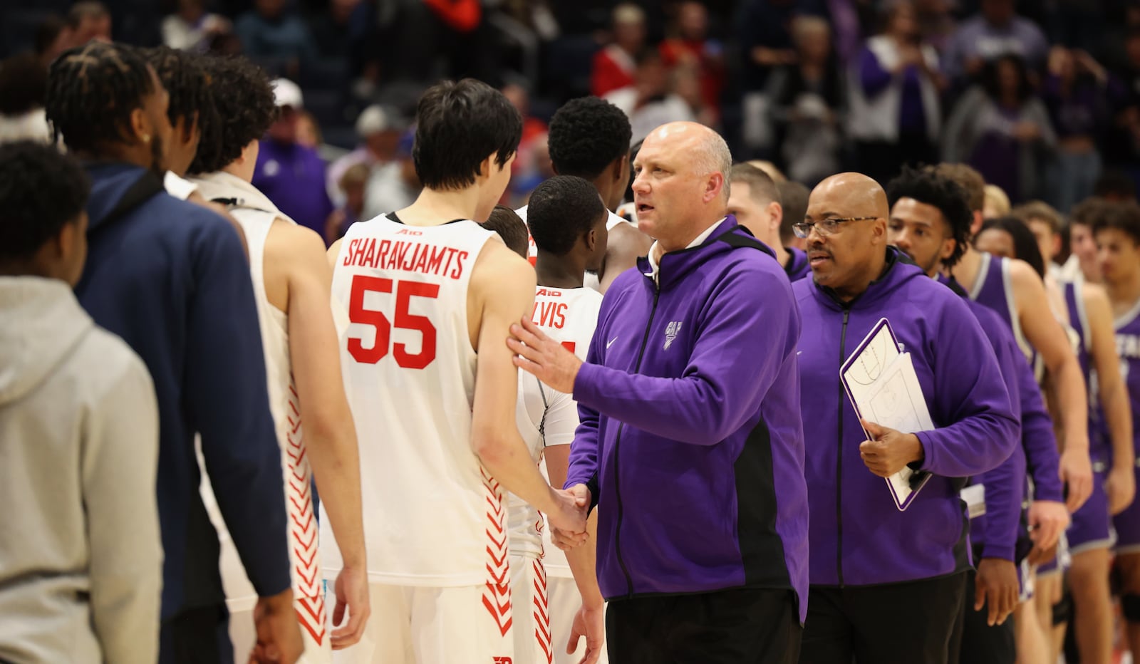 Capital's Damon Goodwin goes through the handshake line after a loss to Dayton in an exhibition game on Saturday, Oct. 29, 2022, at UD Arena. David Jablonski/Staff