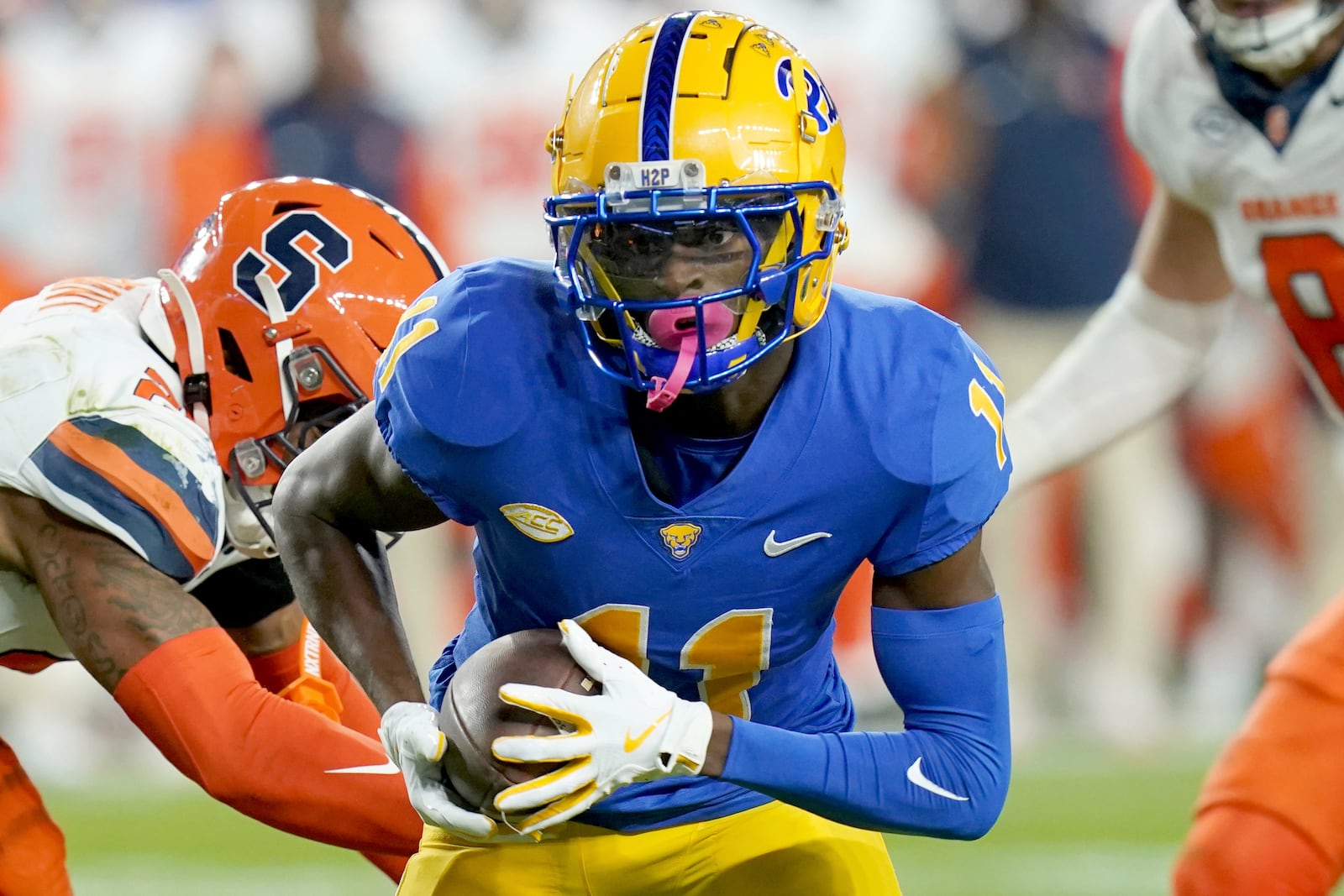 Pittsburgh wide receiver Censere Lee (11) carries for a touchdown during the first half of an NCAA college football game against Syracuse, Thursday, Oct. 24, 2024, in Pittsburgh. (AP Photo/Matt Freed)