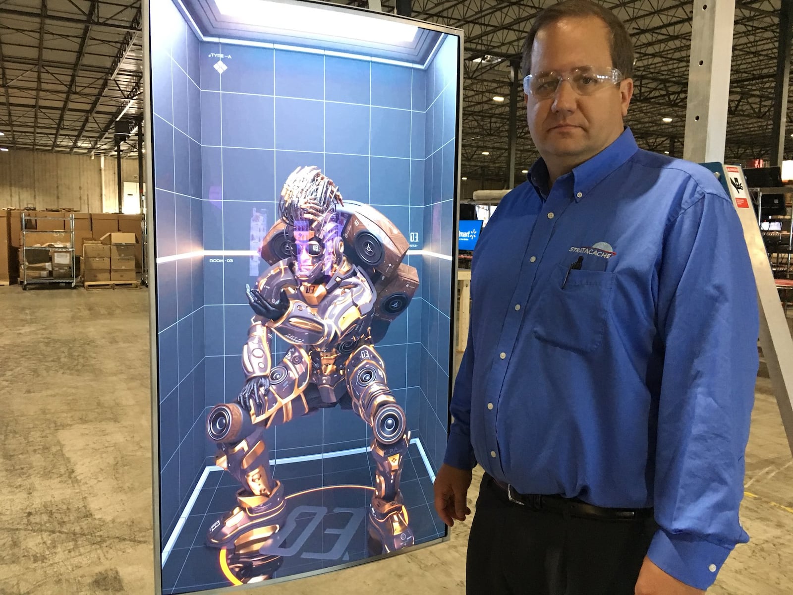 Chris Riegel, founder and CEO of Dayton digital signage company Stratacache, at his company's Trotwood production and distribution site. THOMAS GNAU/STAFF