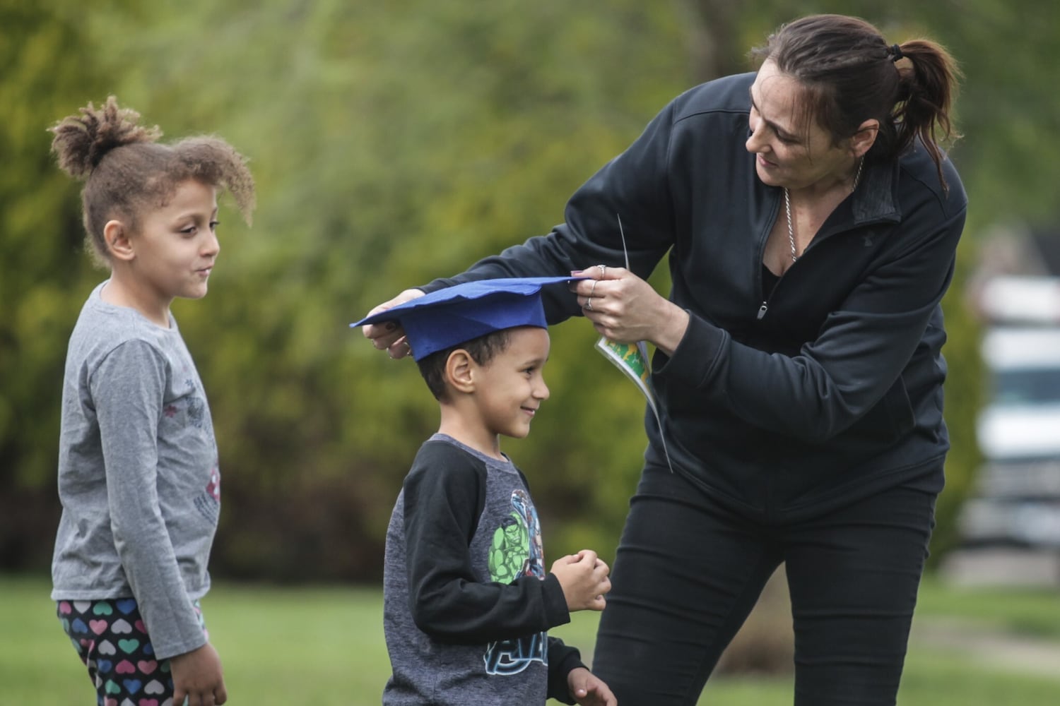 Pre-school porch graduation delights local neighborhood