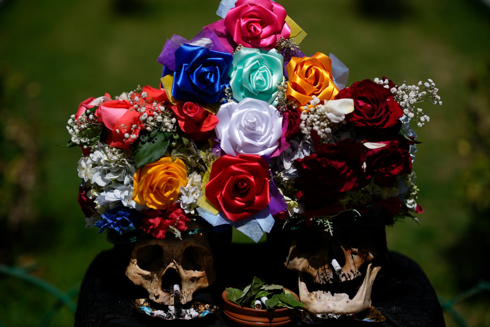 Decorated human skulls sit at the General Cemetery as part of the annual "Ñatitas" festival, a tradition marking the end of the Catholic holiday of All Saints, in La Paz, Bolivia, Friday, Nov. 8, 2024. (AP Photo/Juan Karita)