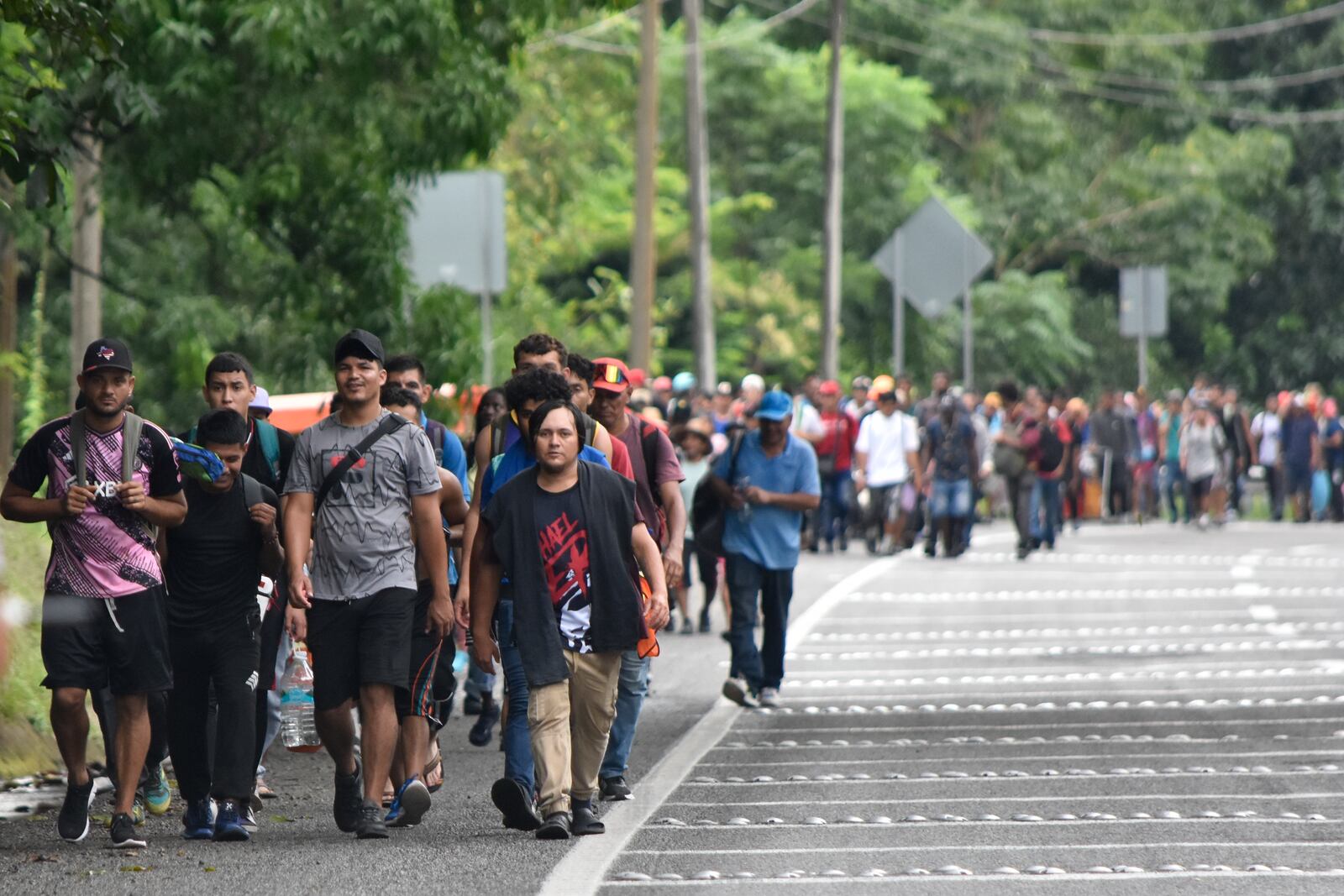 Migrants walk through Tapachula, Chiapas state, Mexico, Wednesday, Nov. 20, 2024, hoping to reach the U.S. border. (AP Photo/Edgar H. Clemente)