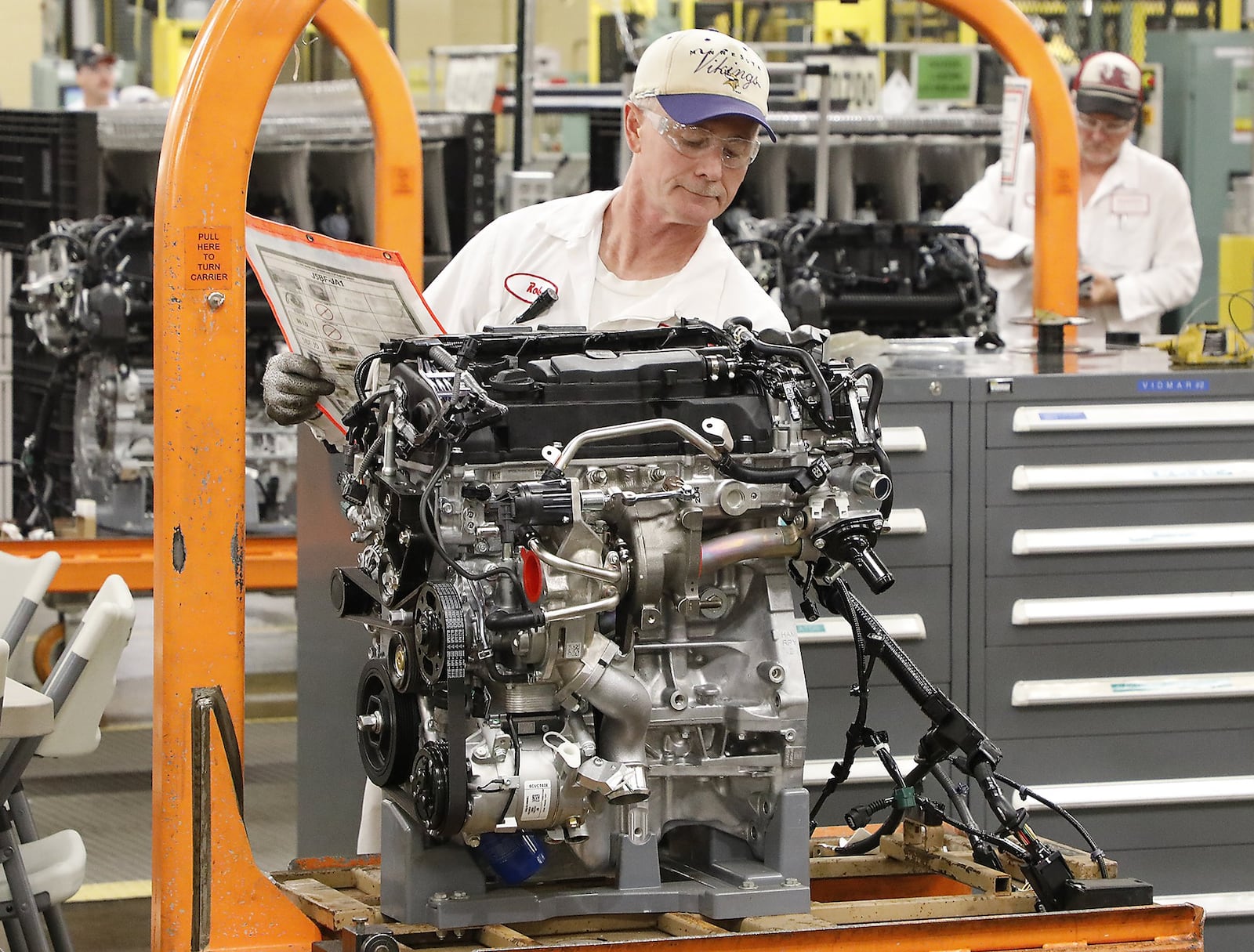 A Honda associate at work in the Honda engine plant in Anna. Bill Lackey/Staff