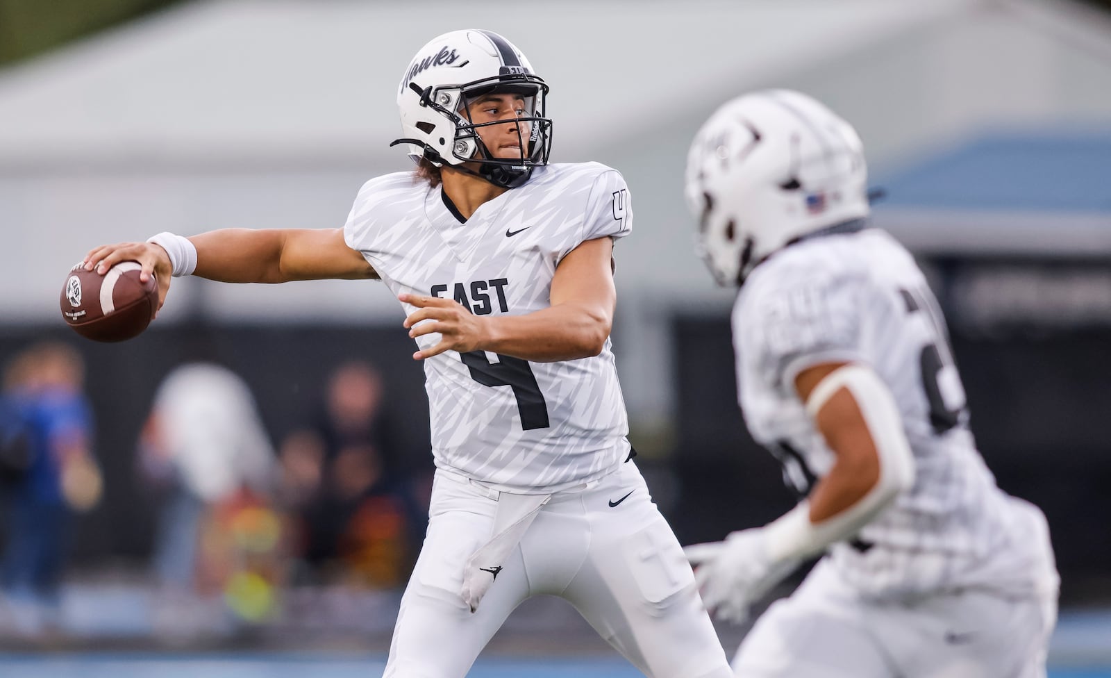 Lakota East quarterback Jamison Kitna passes the ball during their football game Friday, Sept. 6, 2024 at Hamilton's Virgil M. Schwarm Stadium. Lakota East won 27-24 in overtime. NICK GRAHAM/STAFF