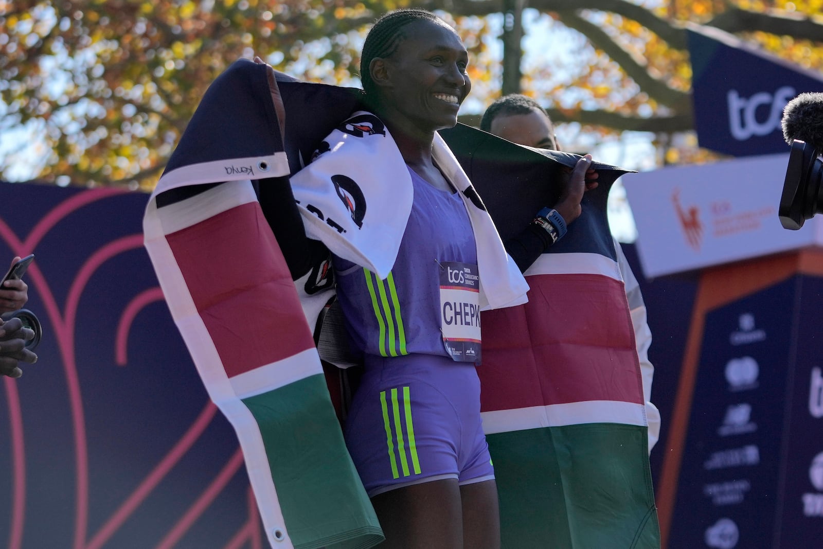 Kenya's Sheila Chepkirui smiles after winning the women's division of the New York City Marathon, Sunday, Nov. 3, 2024, in New York. (AP Photo/Frank Franklin II)