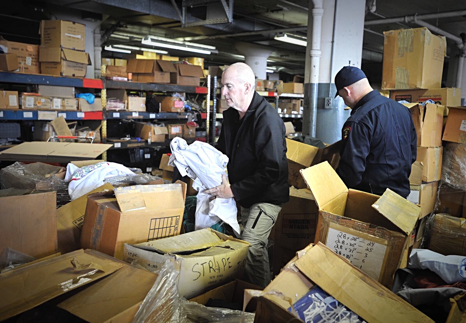 Mendelson’s Donates to Dayton fire and police Departments. Staff photo by Marshall Gorby.