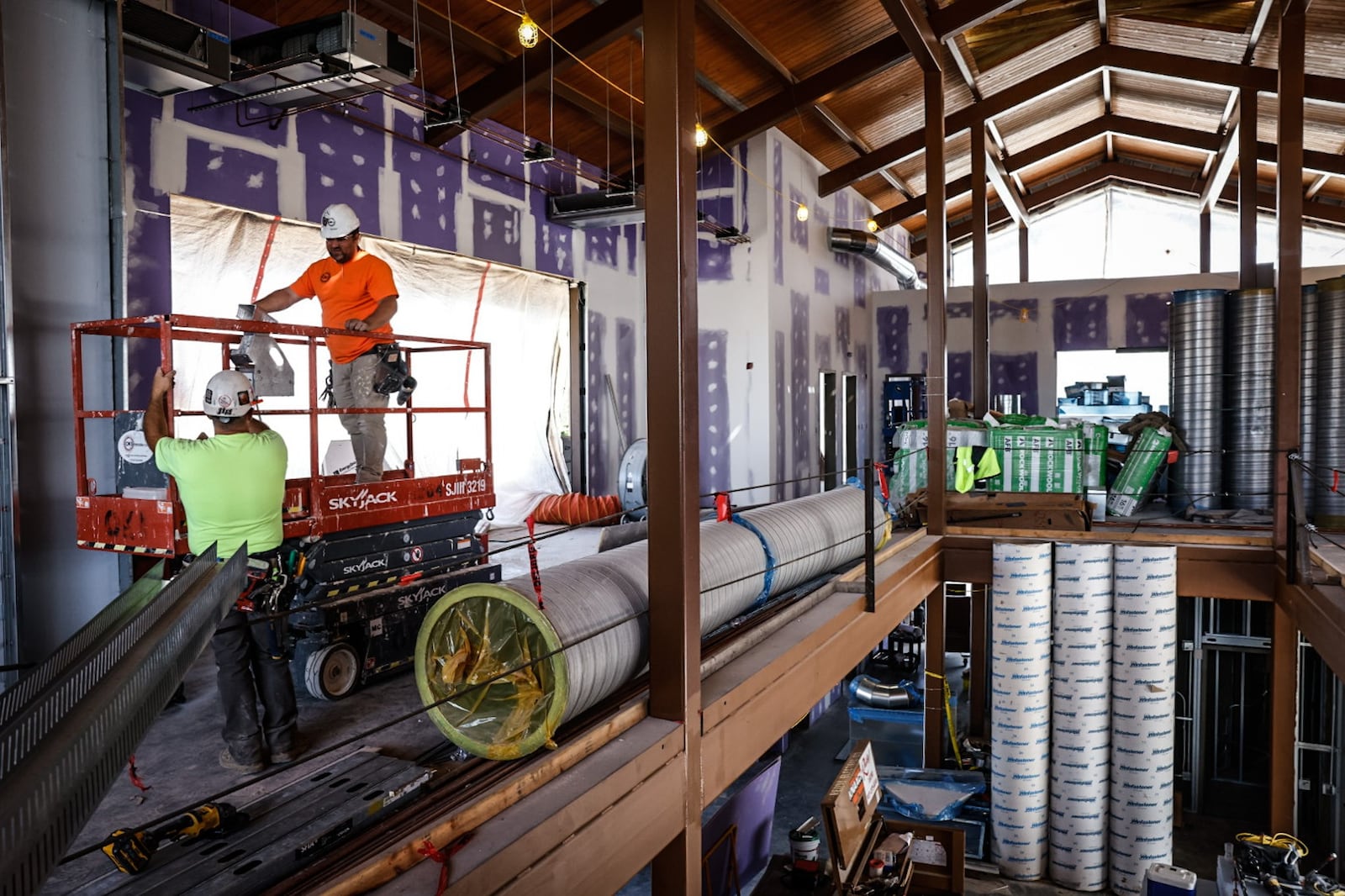 Construction workers are in the process of building the Great Council State Park Interpretive Center Thursday August 31, 2023. The 12,000-square-foot centers design is based on a council house historically used by the Shawnee tribes. JIM NOELKER/STAFF