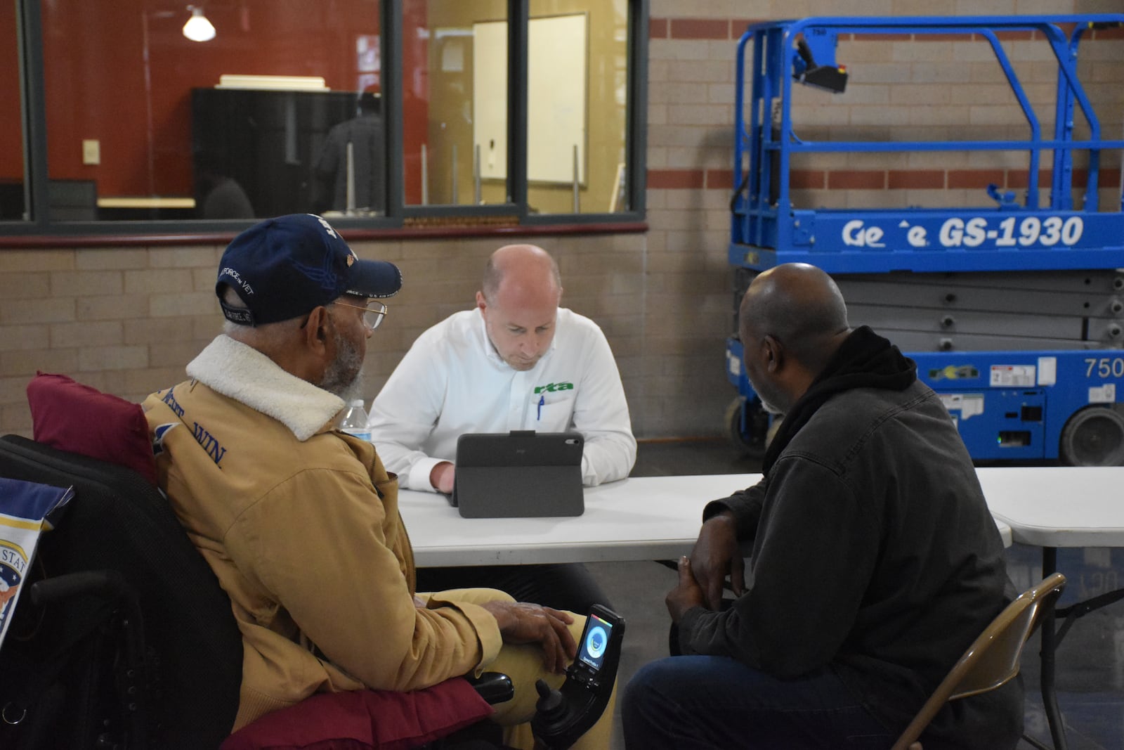 Brandon Policicchio, chief customer and business development officer with the Greater Dayton RTA, listens to public feedback during a public hearing about proposed changes to the agency's fare structure held in April 2024. CORNELIUS FROLIK / STAFF