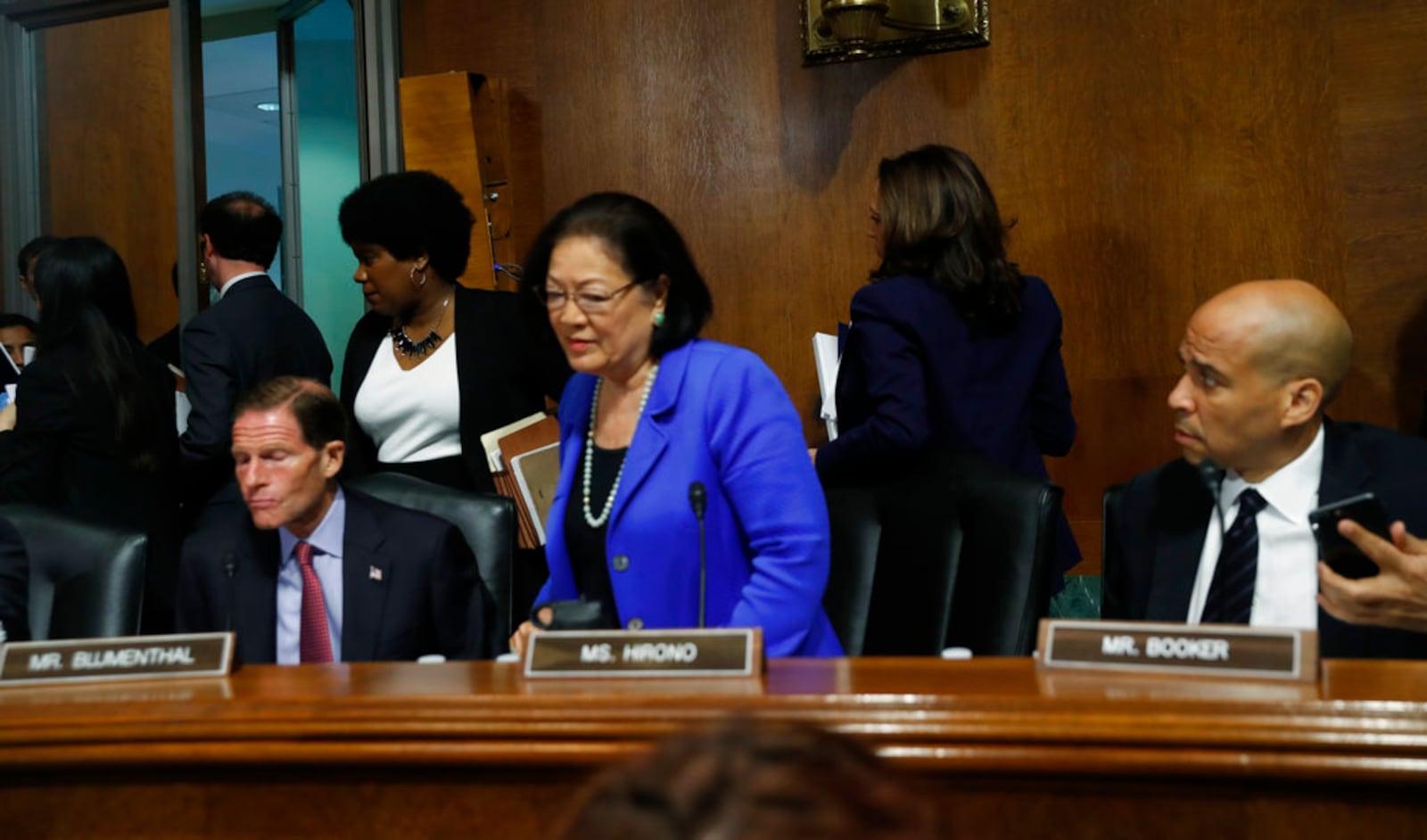 Democratic Senators stand to walk out of a Senate Judiciary Committee meeting, Friday, Sept. 28, 2018 on Capitol Hill in Washington (AP Photo/Pablo Martinez Monsivais)