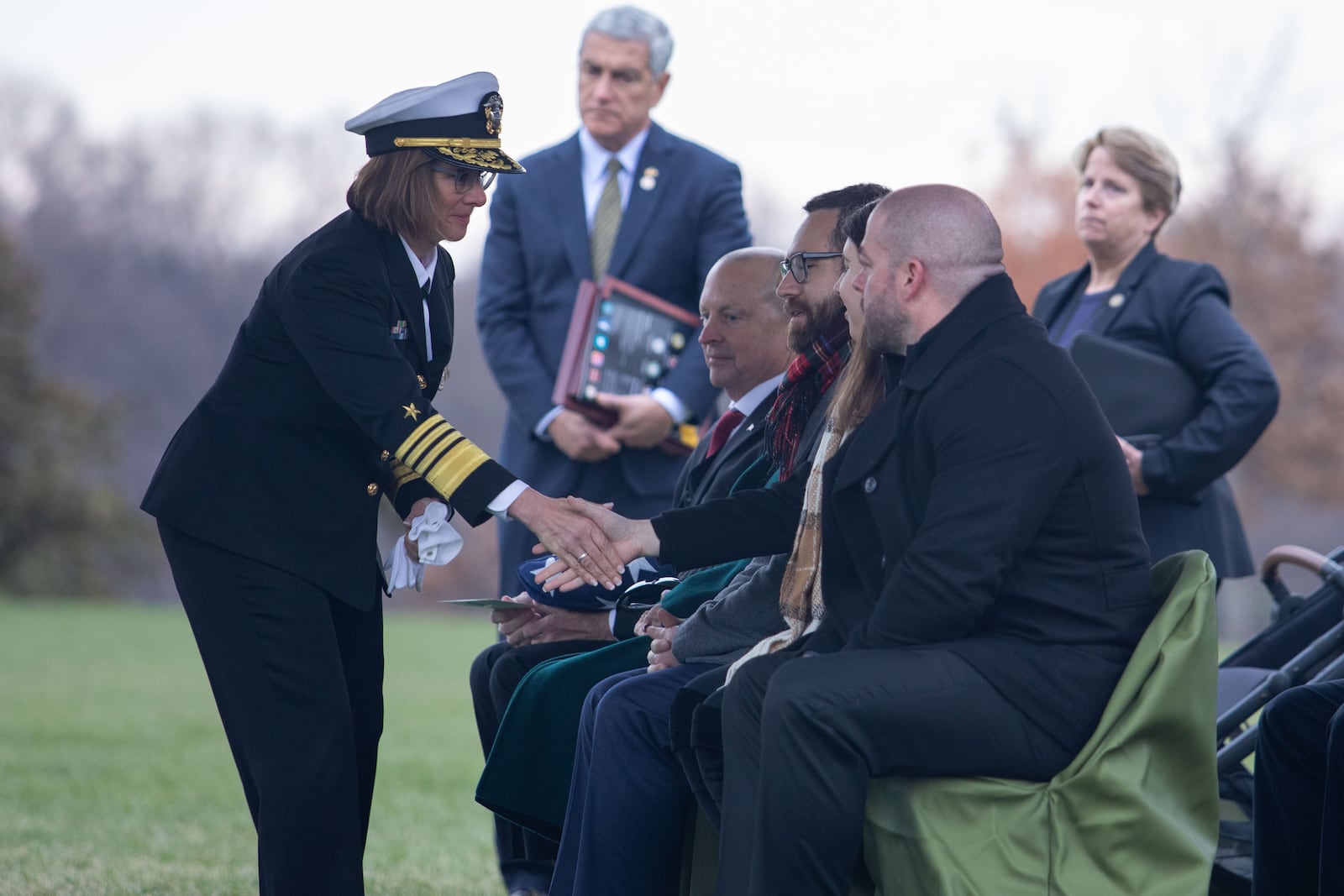 Adm. Lisa Franchetti, Chief of Naval Operations, shares her condolences with the family of Medal of Honor recipient Seaman 1st Class James Richard Ward in the Arlington National Cemetery, Dec. 21, 2023. U.S. Navy photo