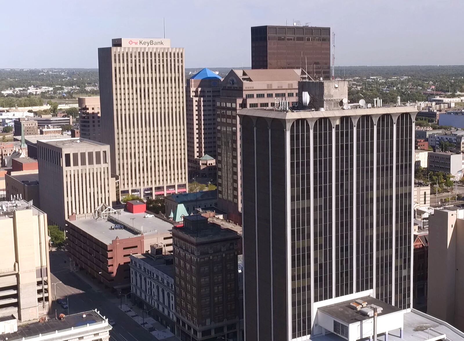 Three of the largest office towers in downtown Dayton -- Key Bank, Courthouse Southwest and Grant Deneau -- are all up for sale. Downtown Dayton has one of the highest vacancy rates in the country, which could be helped or hurt by whether or not these large office towers are bought by landlords willing to invest in the properties.  TY GREENLEES / STAFF