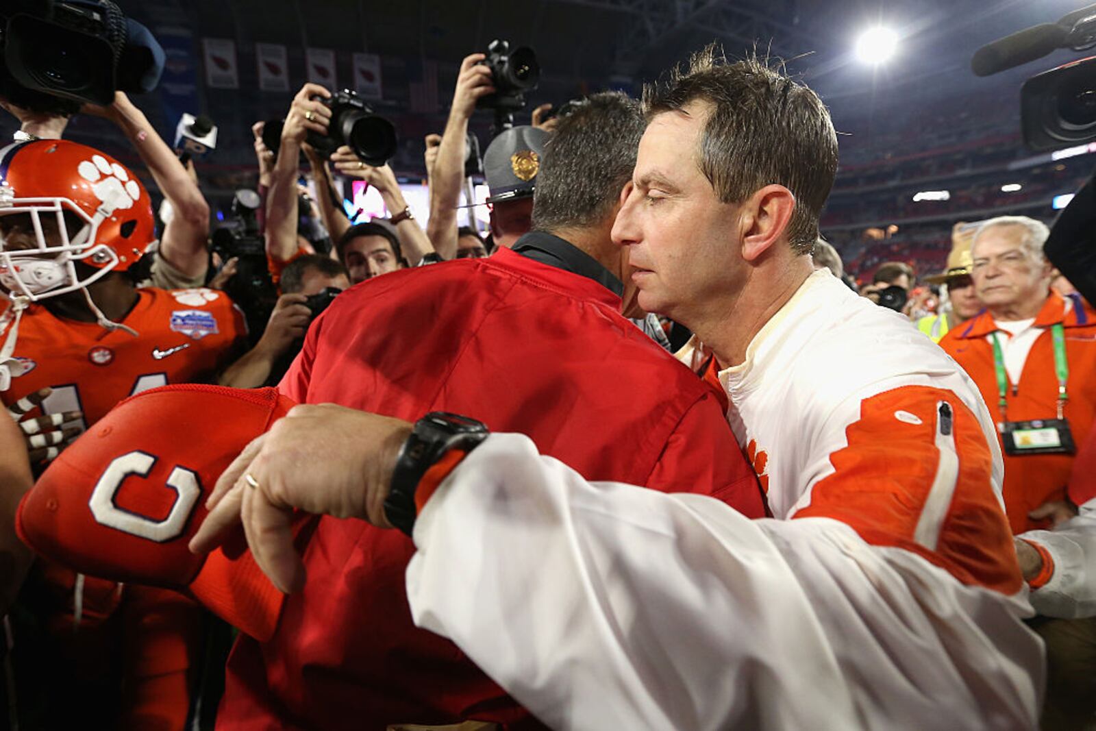 GLENDALE, AZ - DECEMBER 31:  Head coach Dabo Swinney of the Clemson Tigers greets head coach Urban Meyer of the Ohio State Buckeyes after the Clemson Tigers defeated the Ohio State Buckeyes 31-0 to win the 2016 PlayStation Fiesta Bowl at University of Phoenix Stadium on December 31, 2016 in Glendale, Arizona.  (Photo by Christian Petersen/Getty Images)