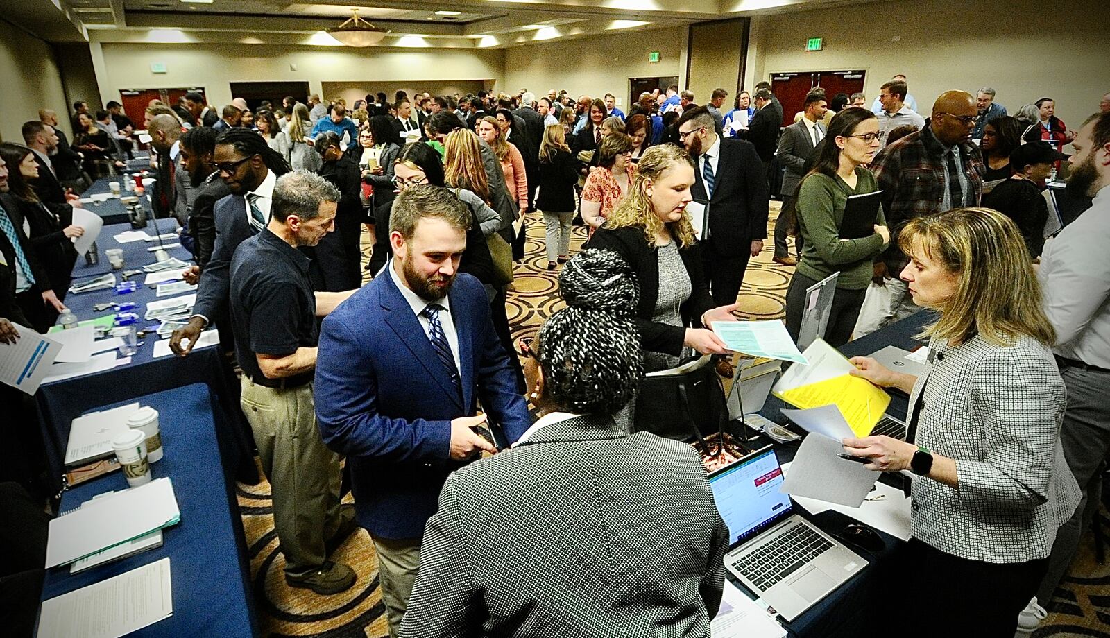 Jobseekers fill the Holiday Inn in Fairborn on Wednesday, March 22, 2023, for the one-day Air Force Life Cycle Management Center hiring event. AFLCMC is based at Wright-Patterson Air Force Base, home to some 35,000 military and civilian employees. MARSHALL GORBY \STAFF