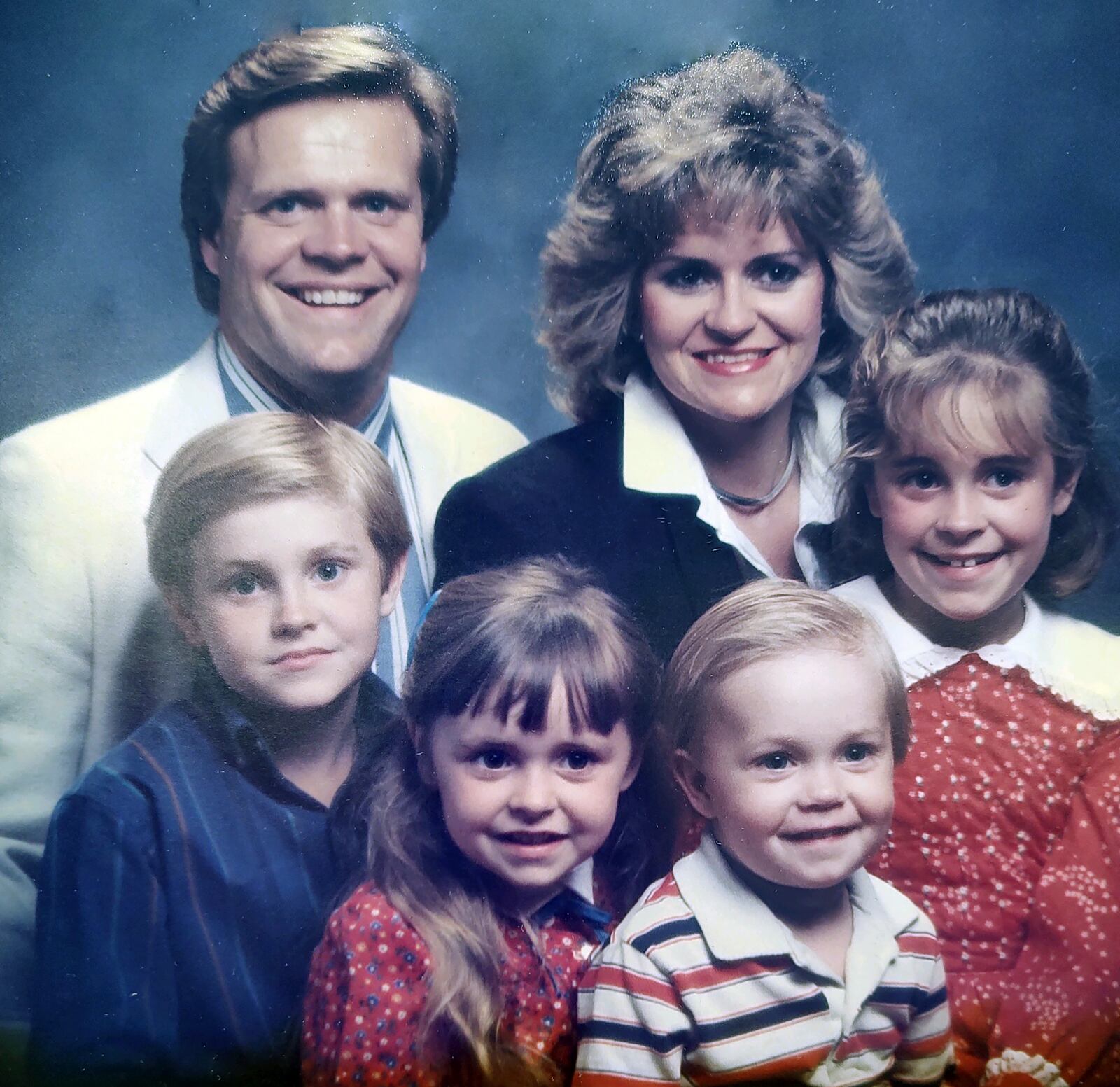 Cristy (top right) and her husband Ken Kettering and their family in 1986
Front row L-R Kyle, Krista, Tyler, Leah