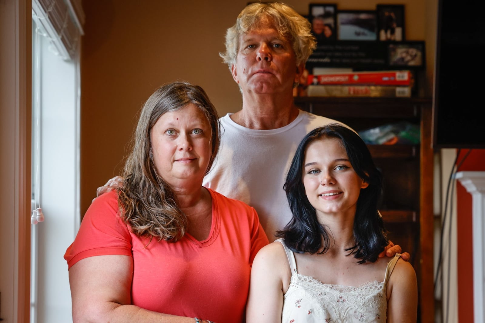 From left, Cheryl Ferenczi, Rick Price helped their daughter Rhiannon Price with her struggles with metal health. JIM NOELKER/STAFF