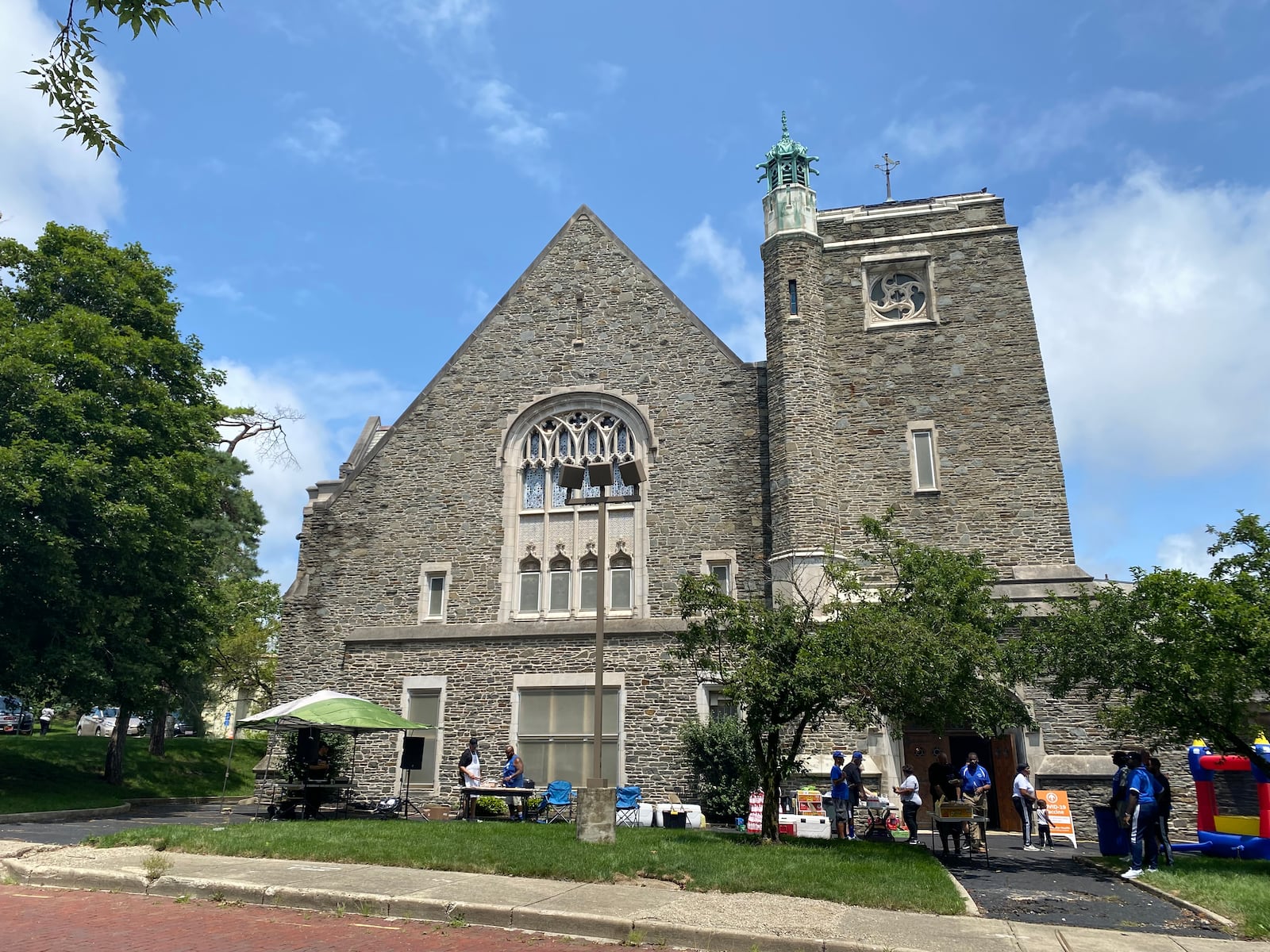 People celebrate Grace United Methodist Church's 100th anniversary of being in the same building in Grafton Hill. Eileen McClory / Staff