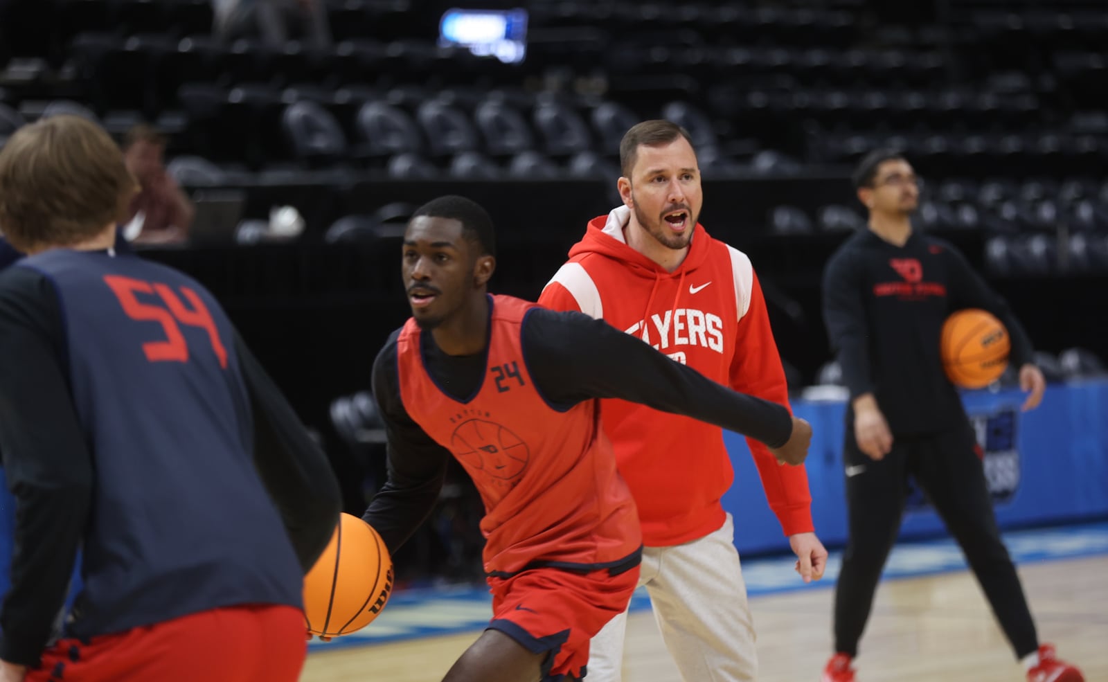 Dayton's James Kane coaches during practice for the NCAA tournament at the Delta Center in Salt Lake City, Utah, on Wednesday, March 20, 2024. David Jablonski/Staff