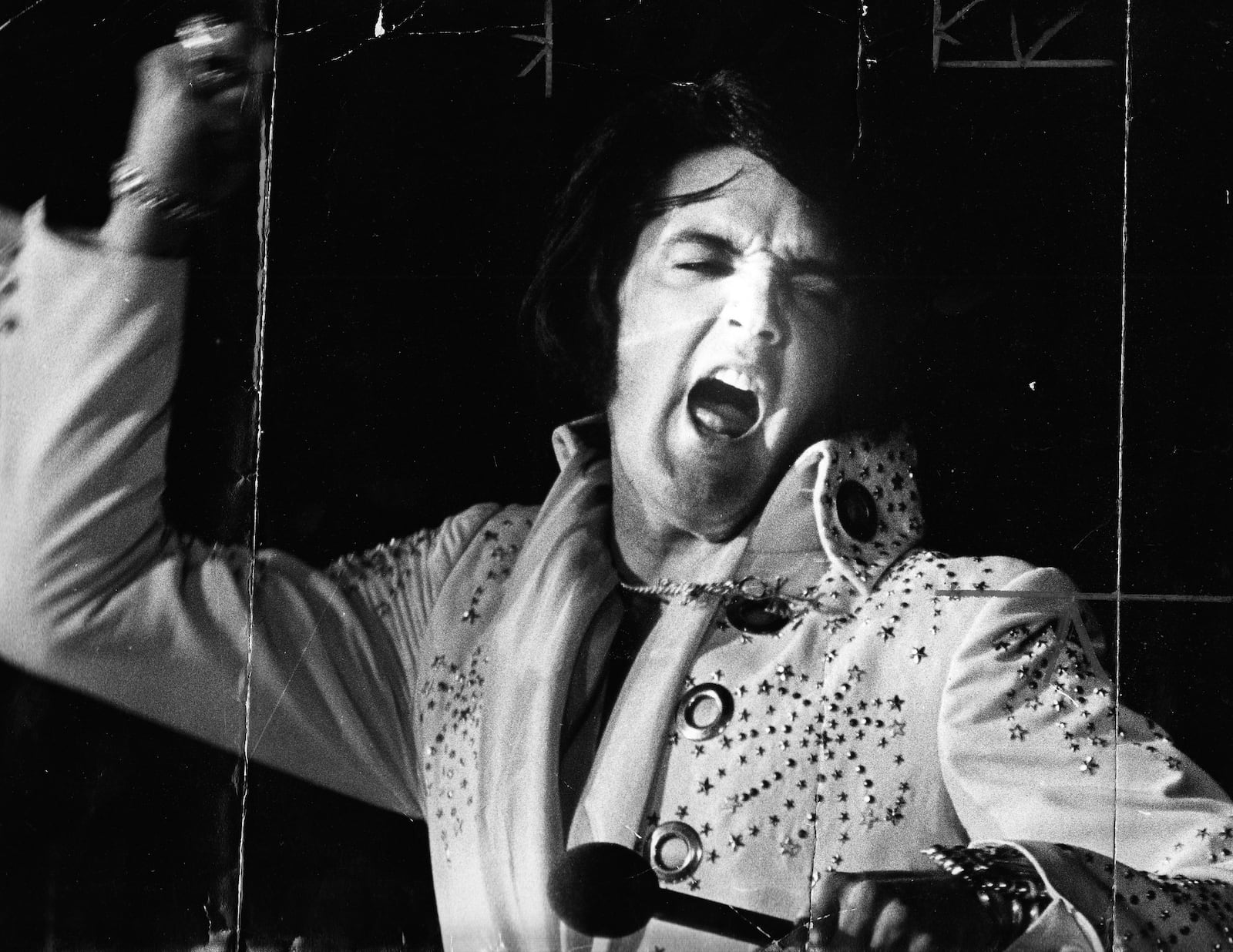 Elvis Presley performed at the University of Dayton Arena April 7, 1972. Crop marks can be seen drawn on the print. DAYTON DAILY NEWS ARCHIVE