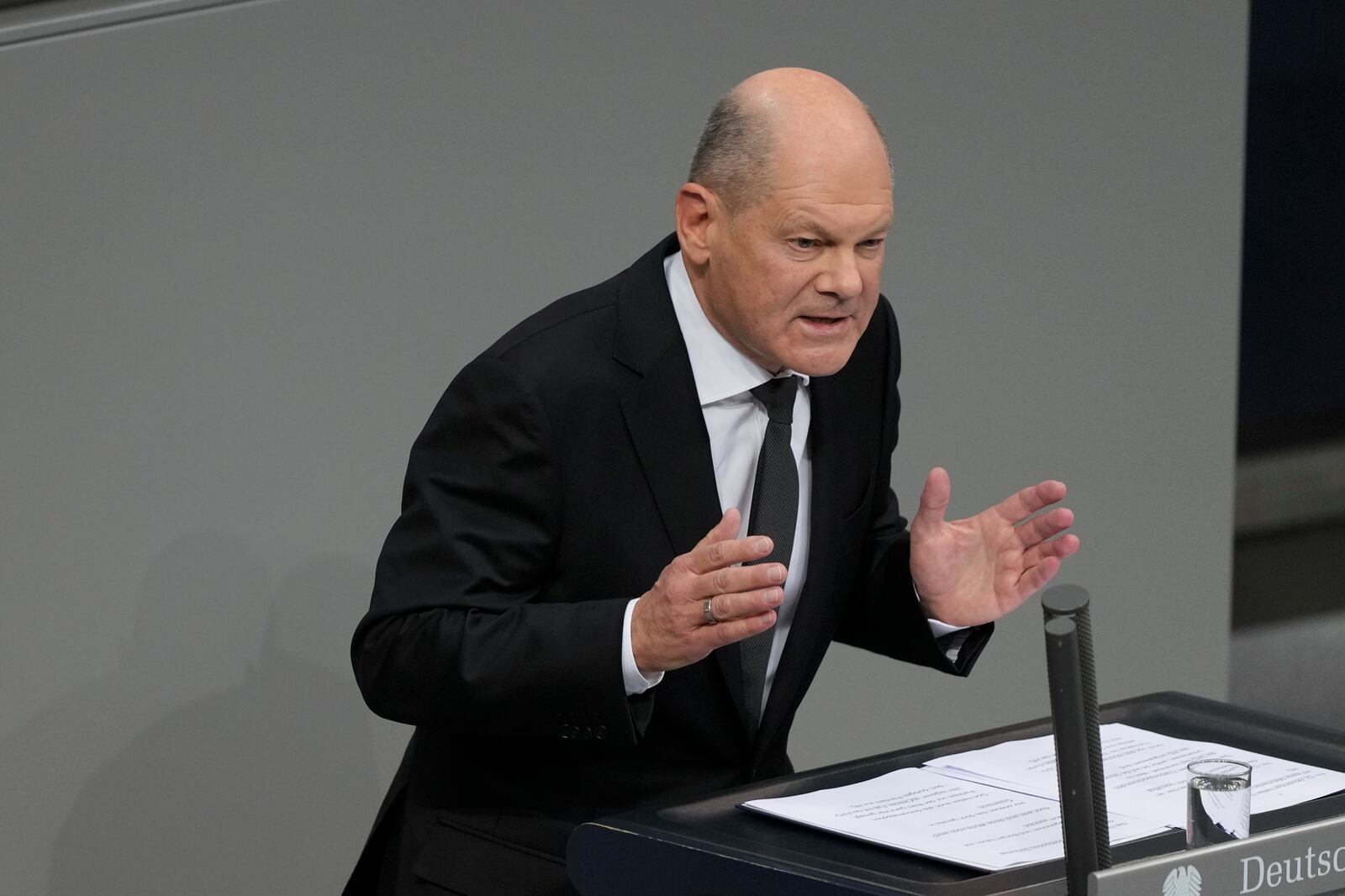 German Chancellor Olaf Scholz speaks at the the beginning of a debate about migration at the German parliament Bundestag in Berlin, Germany, Wednesday, Jan. 29, 2025. (AP Photo/Markus Schreiber)