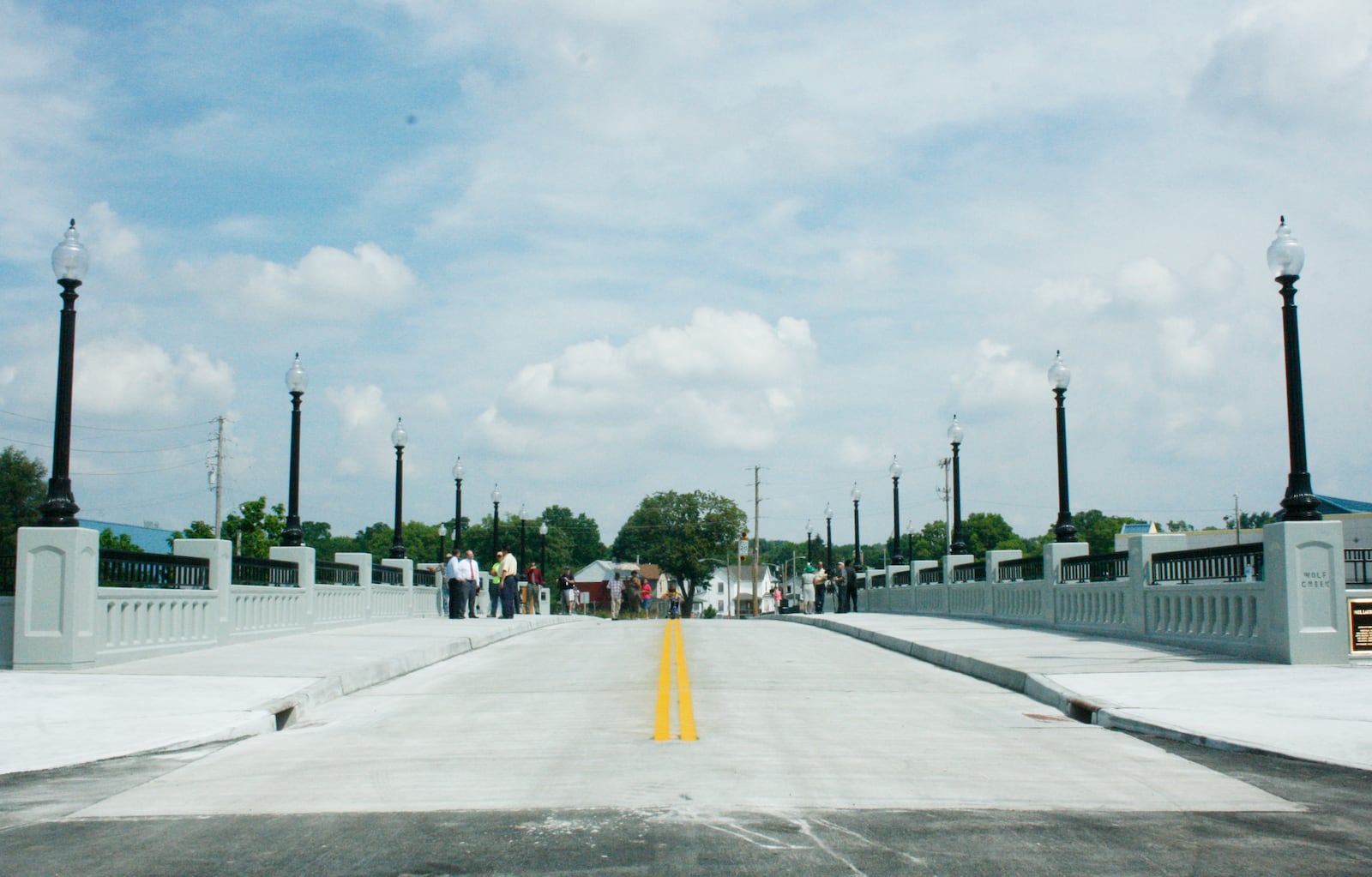 On July 29, 2008 the new Paul Laurence Dunbar Street Bridge, which spans the Wolf Creek and provides a new gateway into the Wright-Dunbar Village, was ceremonially dedicated.  The bridge is 210 feet long and features 10 foot wide sidewalks.  Staff photo by Annye Driscoll