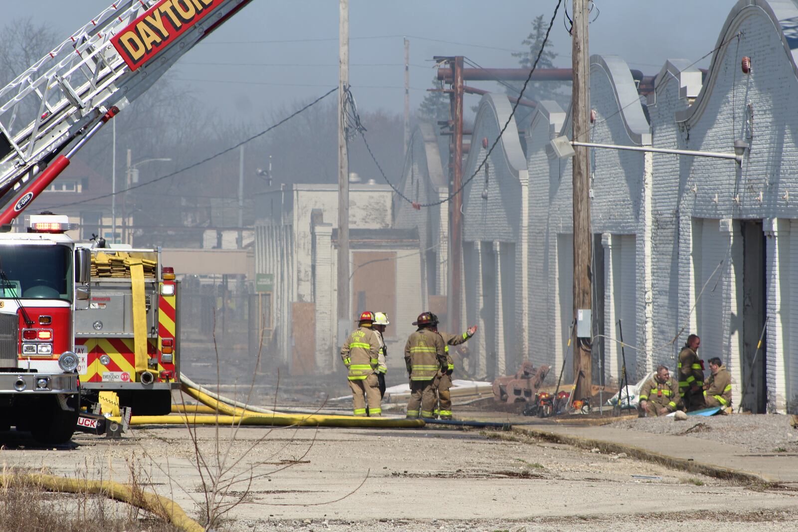 Dayton firefighters at the scene of a fire at the historic Wright brothers factory site in West Dayton on Sunday, March 26, 2023. CORNELIUS FROLIK / STAFF