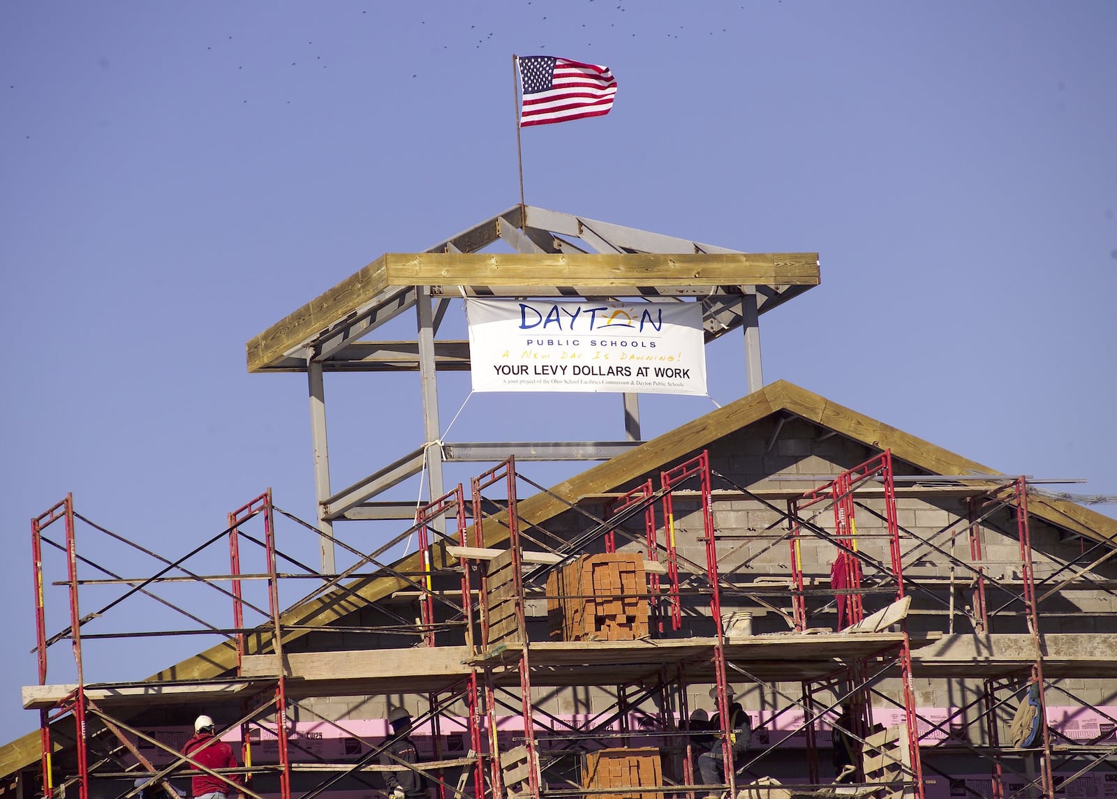 The final steel beam was hoisted into place for the new Wogaman School in January 2006, as part of the district’s 25-school building program. Dayton Public Schools officials now say they need to invest in upkeep on those buildings. JEREMY P. KELLEY