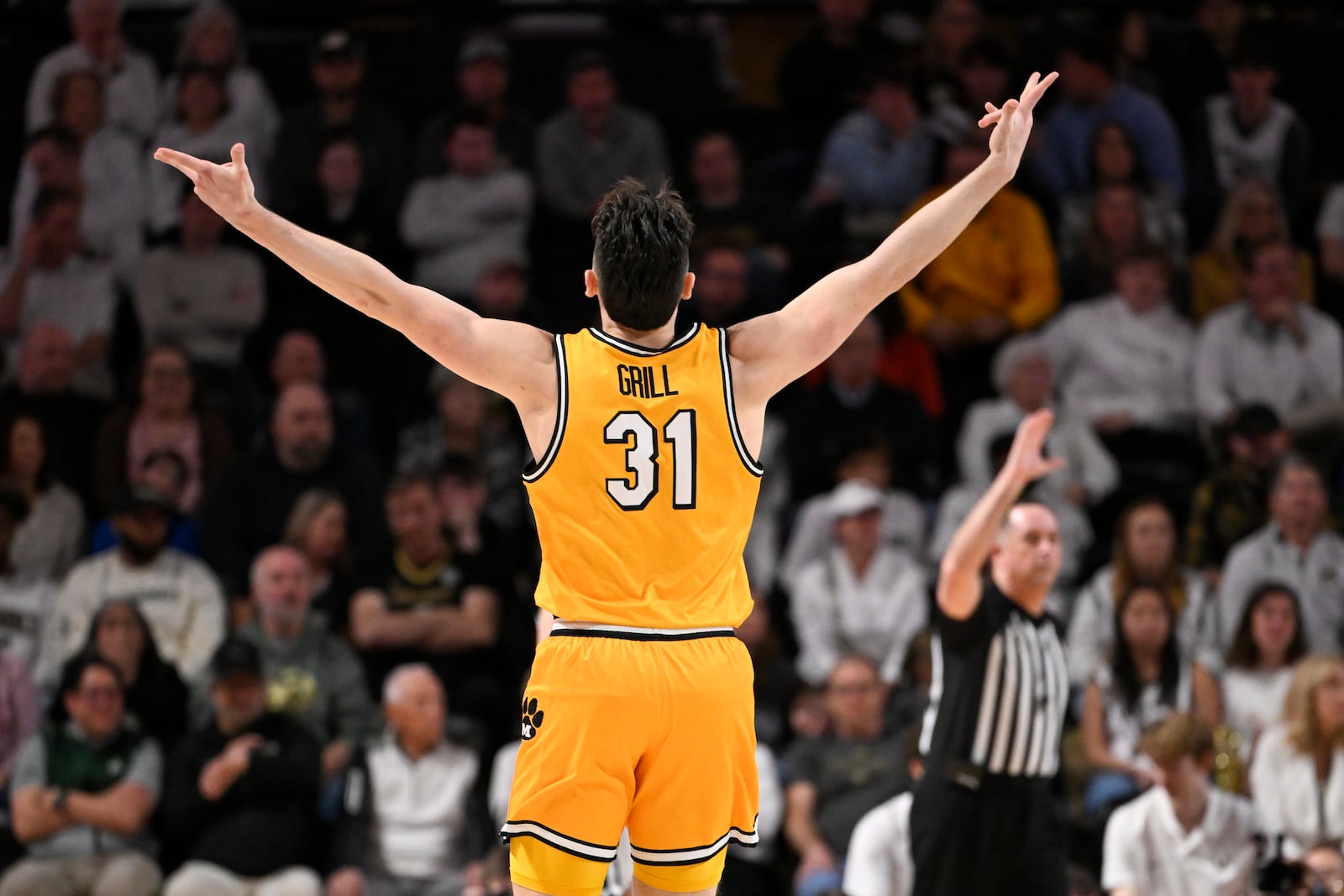 Missouri guard Caleb Grill (31) reacts after sinking a 3-point basket against Vanderbilt during the first half of an NCAA college basketball game Saturday, March 1, 2025, in Nashville, Tenn. (AP Photo/John Amis)