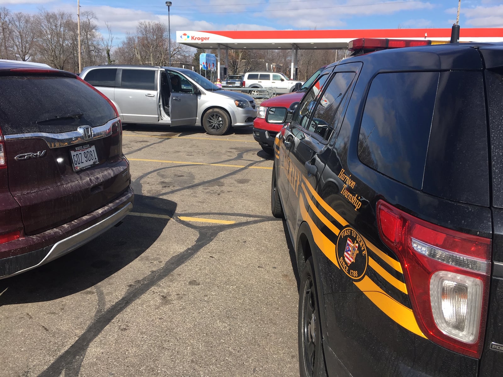 Deputies investigate a reported shooting at the Kroger location on West Siebenthaler Avenue in Harrison Twp.