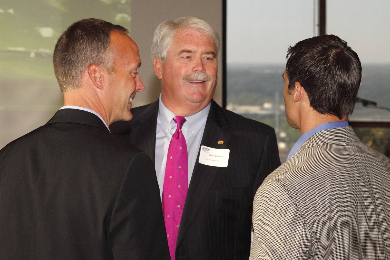 Kettering Mayor Don Patterson, middle, worked regularly with local and regional business leaders to advance the city.