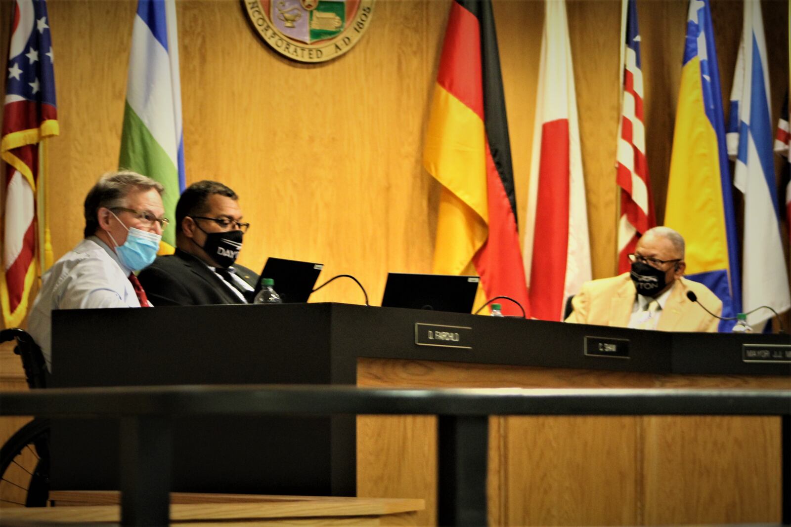 Dayton City Commissioners Darryl Fairchild, Chris Shaw and Mayor Jeffrey Mims Jr at Wednesday's commission meeting. CORNELIUS FROLIK / STAFF