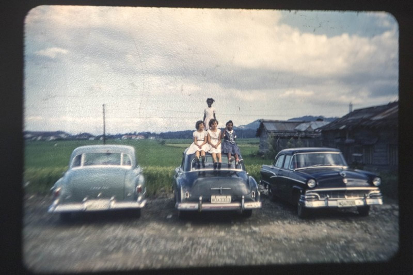 Do these kids or cars look familiar? Email us at jbrett@ajc.com.