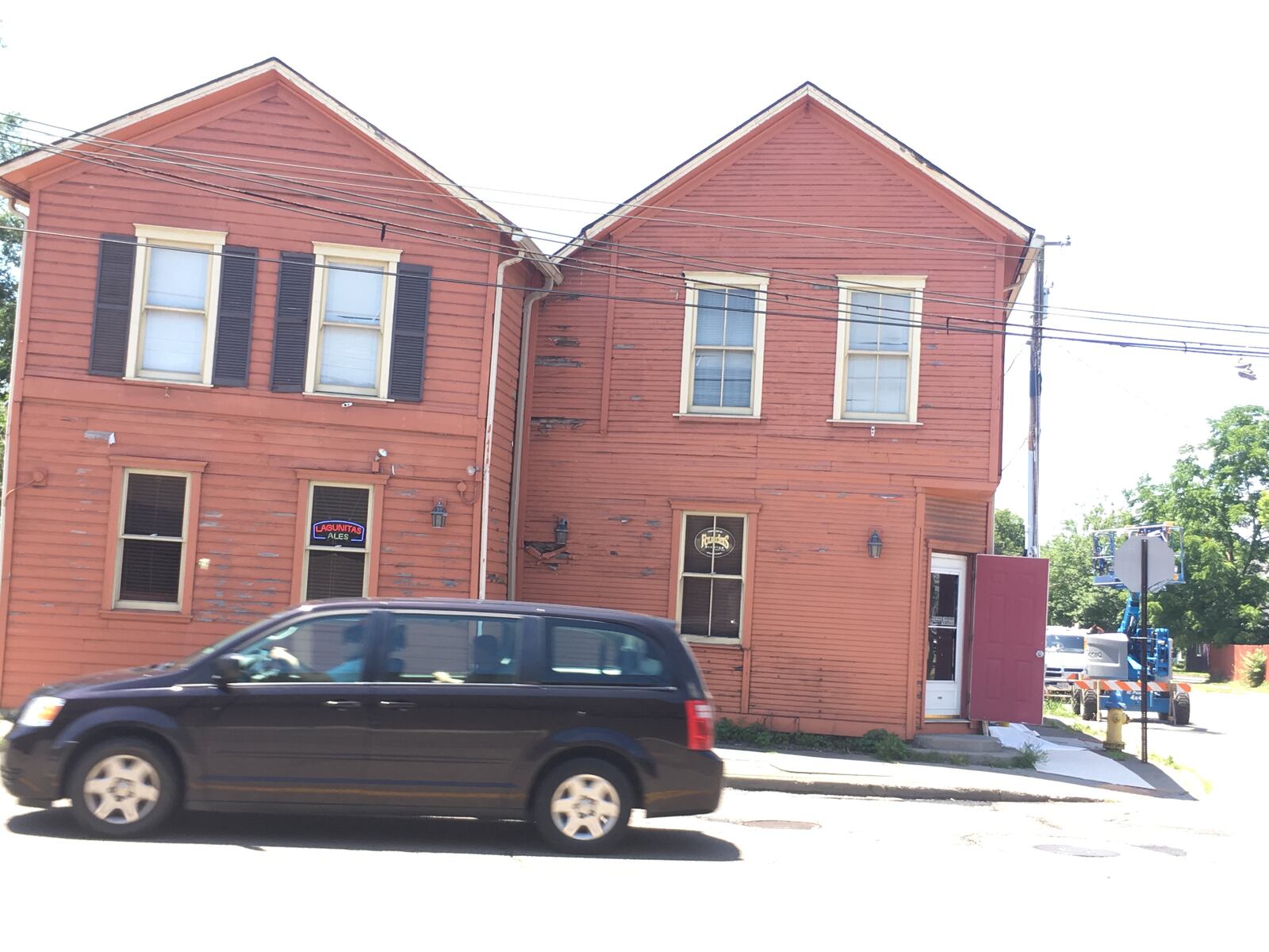 Brian Ferguson, the owner of Zada Paint Works, said he loves painting some of the city's oldest buildings.  His work includes the South Park Tavern building.  This photo was taken before Ferguson applied paint.