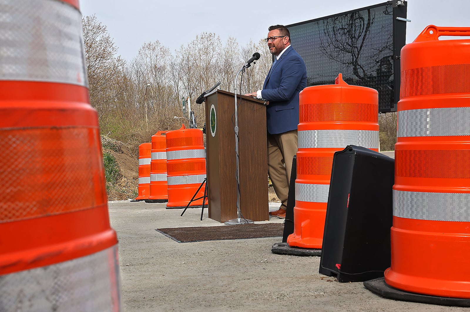 Joshua Bowman, ODOT District 7 construction engineer, talks about all the construction projects on the District 7 roadways Tuesday during the 2021 ODOT Construction Season Kickoff in Springfield. BILL LACKEY/STAFF