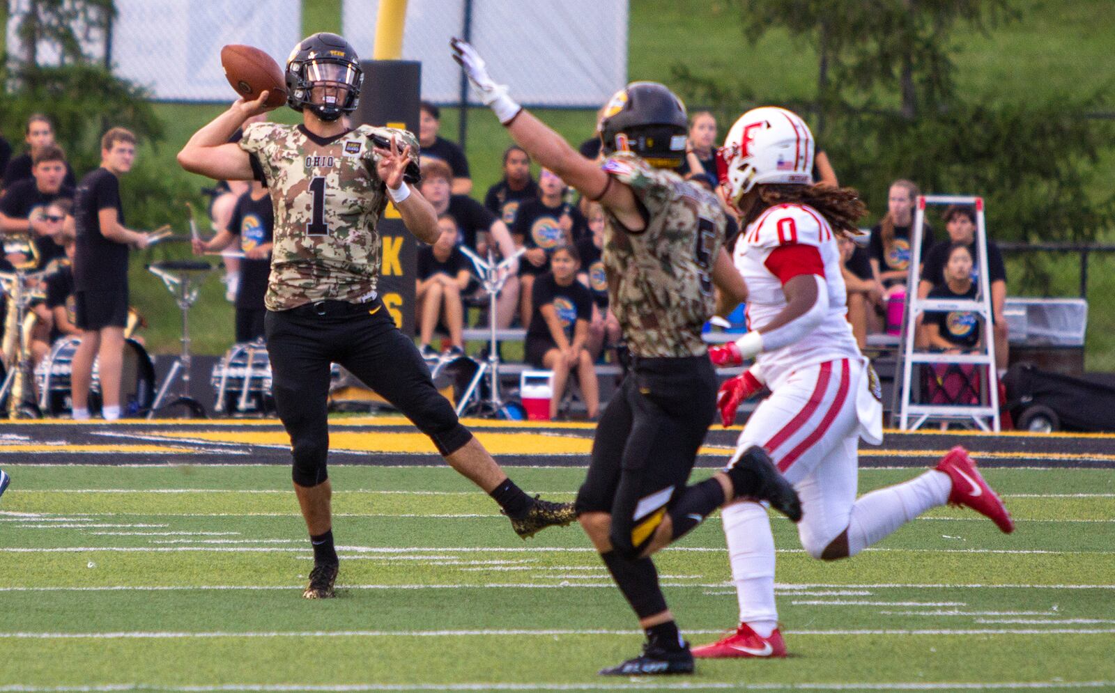 Centerville quarterback Chase Harrison fires a throw downfield during the season-opening win over Fairfield. Harrison leads the GWOC with 840 passing yards and seven touchdowns through four games. Jeff Gilbert/CONTRIBUTED