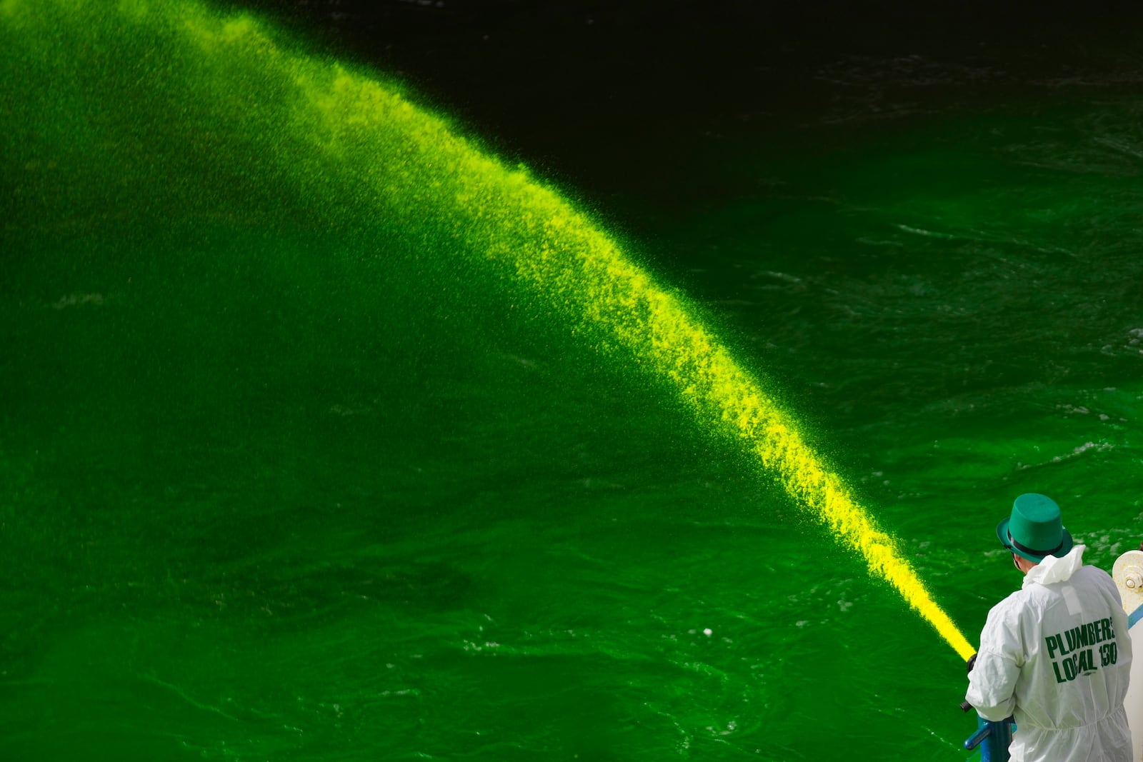 The Chicago River is dyed green as part of annual St. Patrick's Day festivities Saturday, March 15, 2025, in Chicago. (AP Photo/Erin Hooley)