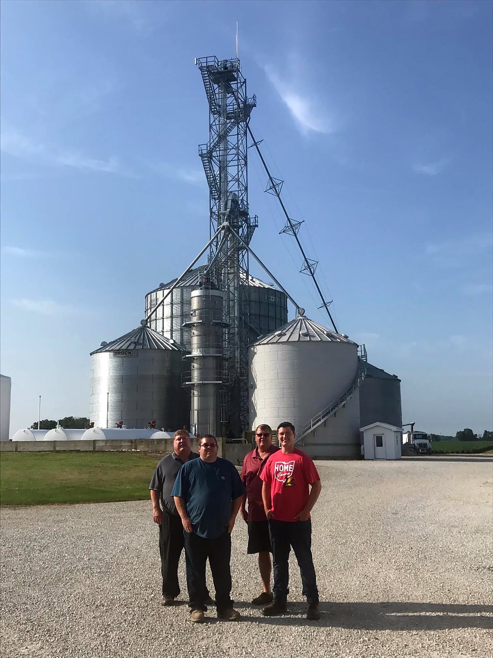 Joe Everett, far right, stands with other Everett Farms family members, from left, his uncle Tim Everette, his cousin Tyler Everett and his dad Jon Everett. CONTRIBUTED