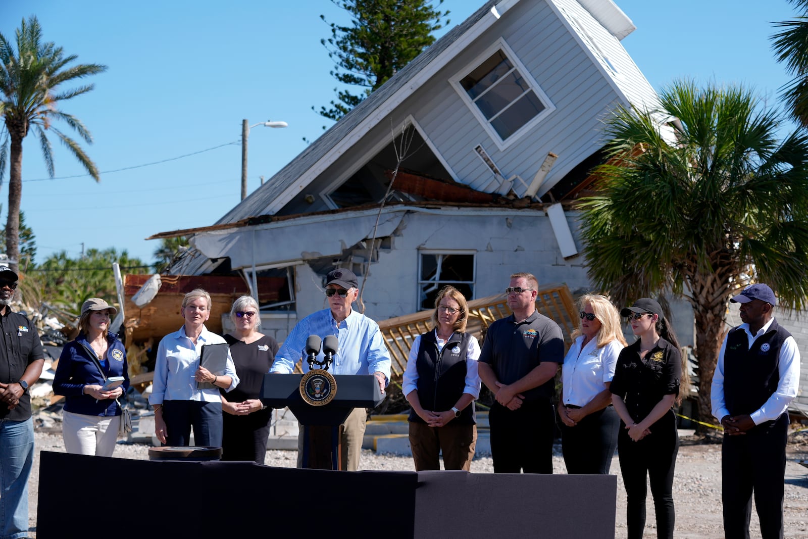 President Joe Biden speaks following a briefing by federal, state, and local officials in St. Pete Beach, Fla., during a tour of areas affected by Hurricane Milton, Sunday, Oct. 13, 2024. (AP Photo/Manuel Balce Ceneta)