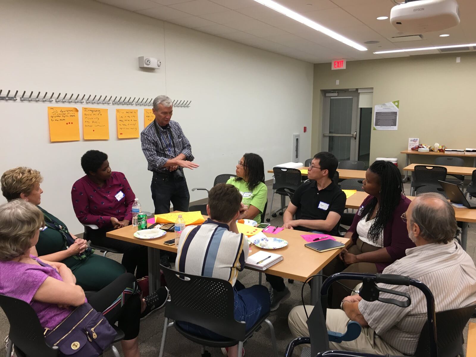 Doug Oplinger of Your Voice Ohio talks to community members at a forum held Tuesday at the Kettering-Moraine branch of the Dayton Metro Library. LYNN HULSEY/Staff