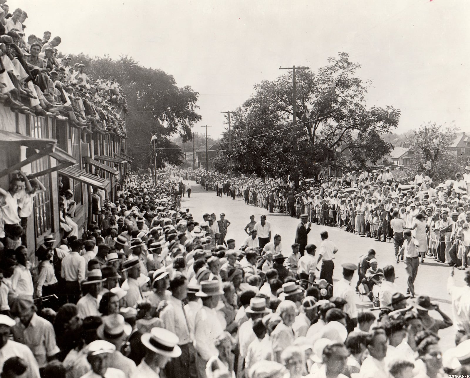 A crowd estimated at more than 40,000 lined Burkhardt Avenue in Dayton and found vantage points on top of buildings to watch the first soap box derby race in 1933. DAYTON DAILY NEWS ARCHIVE